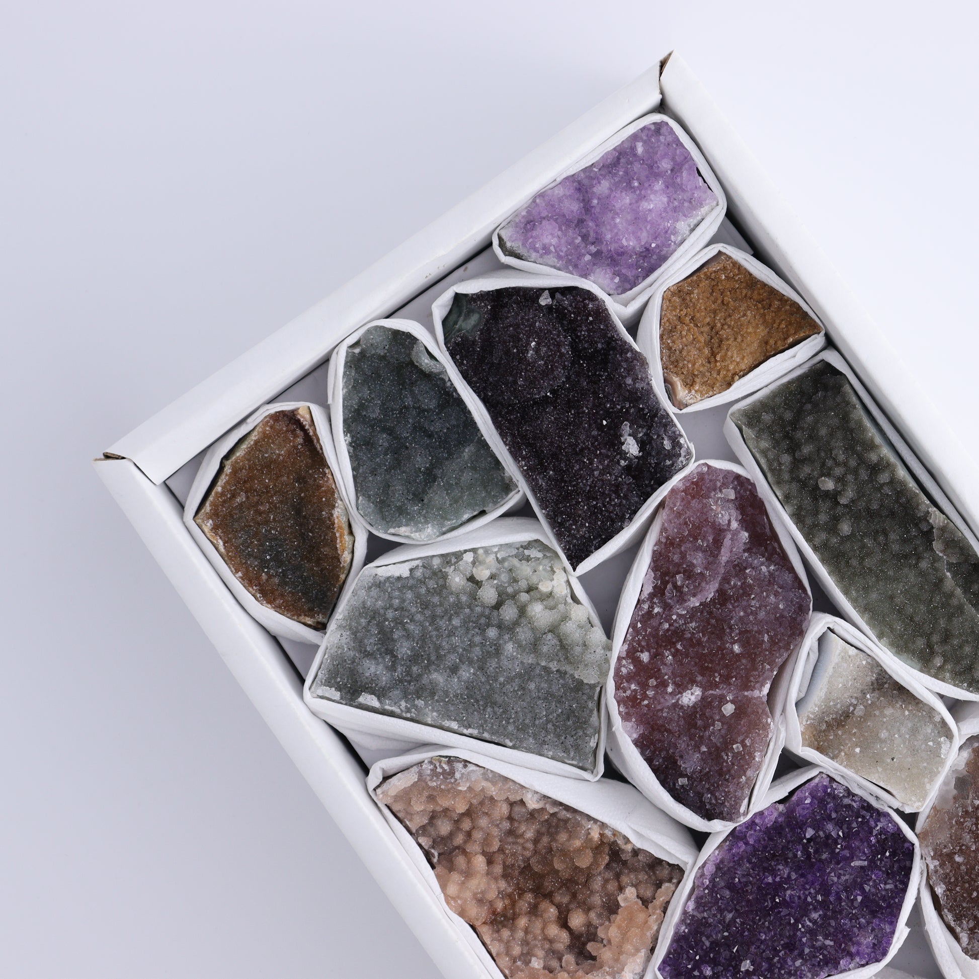 Uruguay Rainbow Amethyst Clusters Flat of 13 - Expert Wholesale and Supplier of Wholesale Crystals & Bulk Gemstones, ["Amethyst","Clusters","Rainbow Amethyst","Sugar Rainbow Amethyst","Uruguay"]