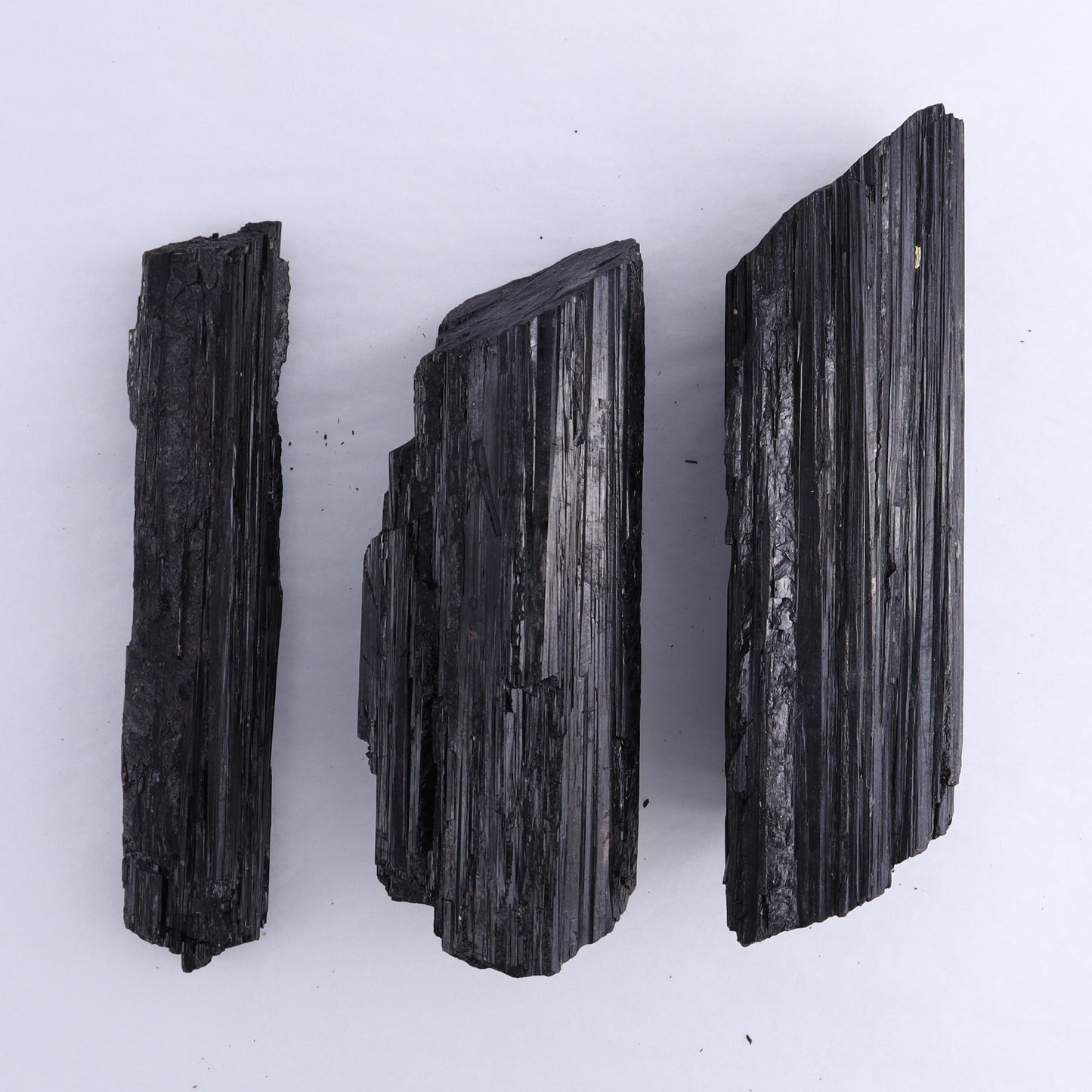 Black Tourmaline Log Set of 3 - Expert Wholesale and Supplier of Wholesale Crystals & Bulk Gemstones, ["Black Tourmaline","logs","Madagascar","Rough","Tourmaline"]