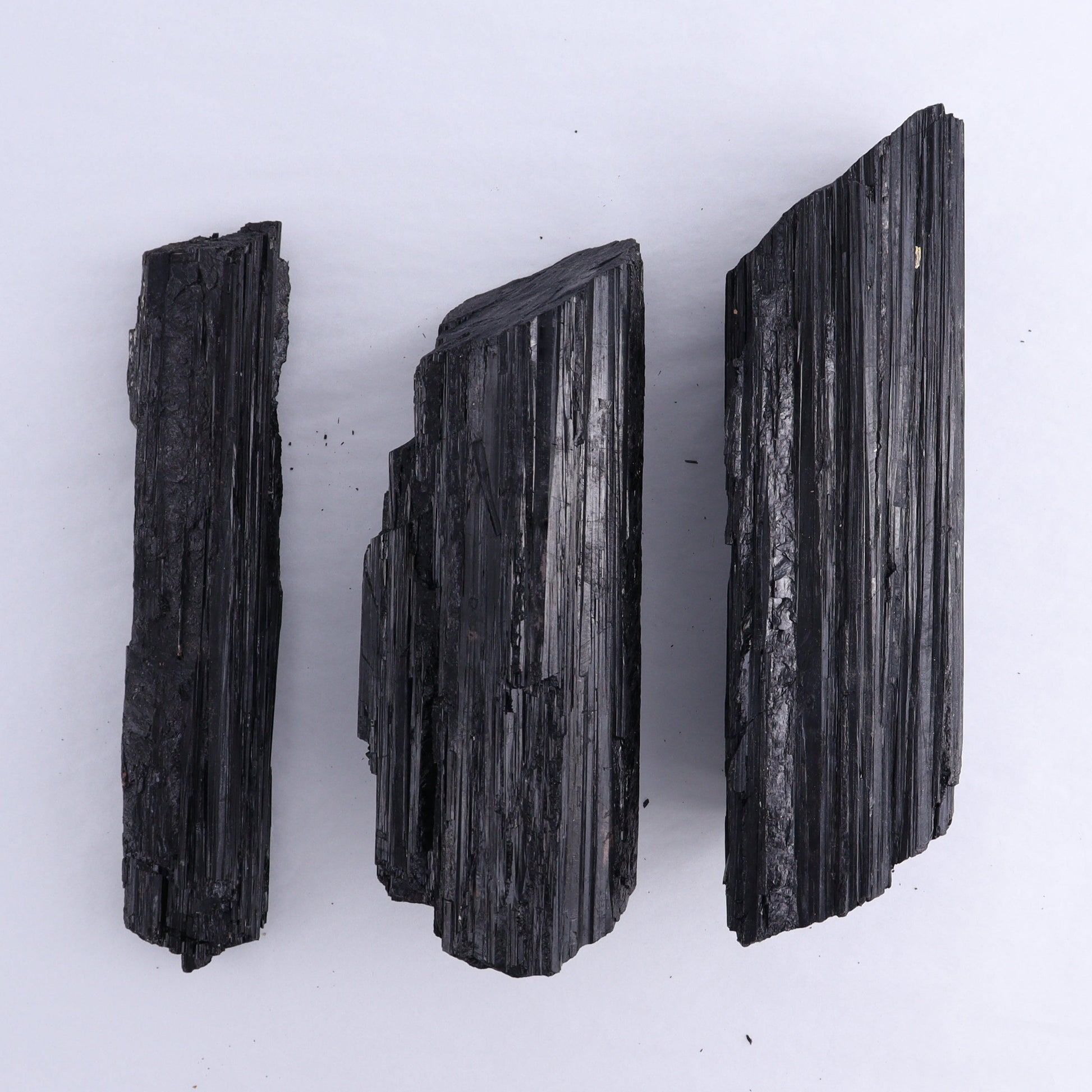Black Tourmaline Log Set of 3 - Expert Wholesale and Supplier of Wholesale Crystals & Bulk Gemstones, ["Black Tourmaline","logs","Madagascar","Rough","Tourmaline"]