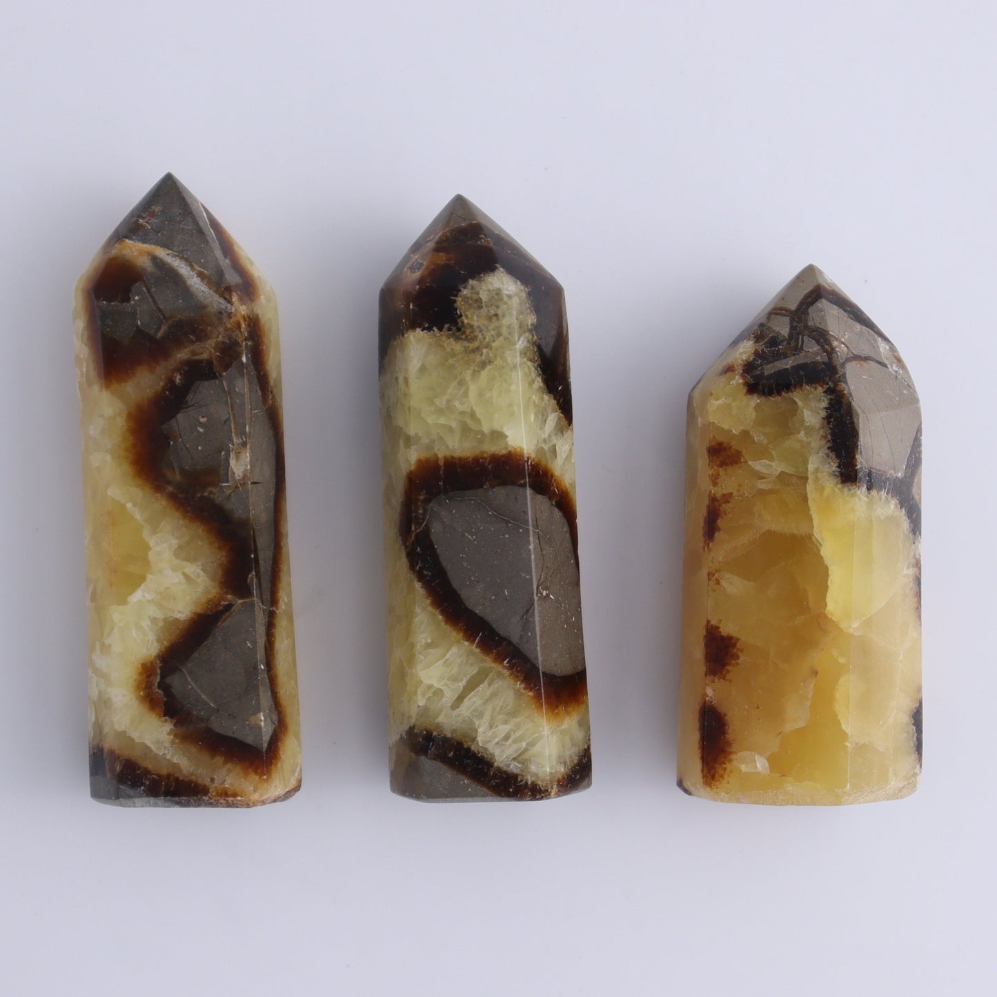 Septarian Towers Set of 9 - Expert Wholesale and Supplier of Wholesale Crystals & Bulk Gemstones, ["Madagascar","Septarian","Towers"]