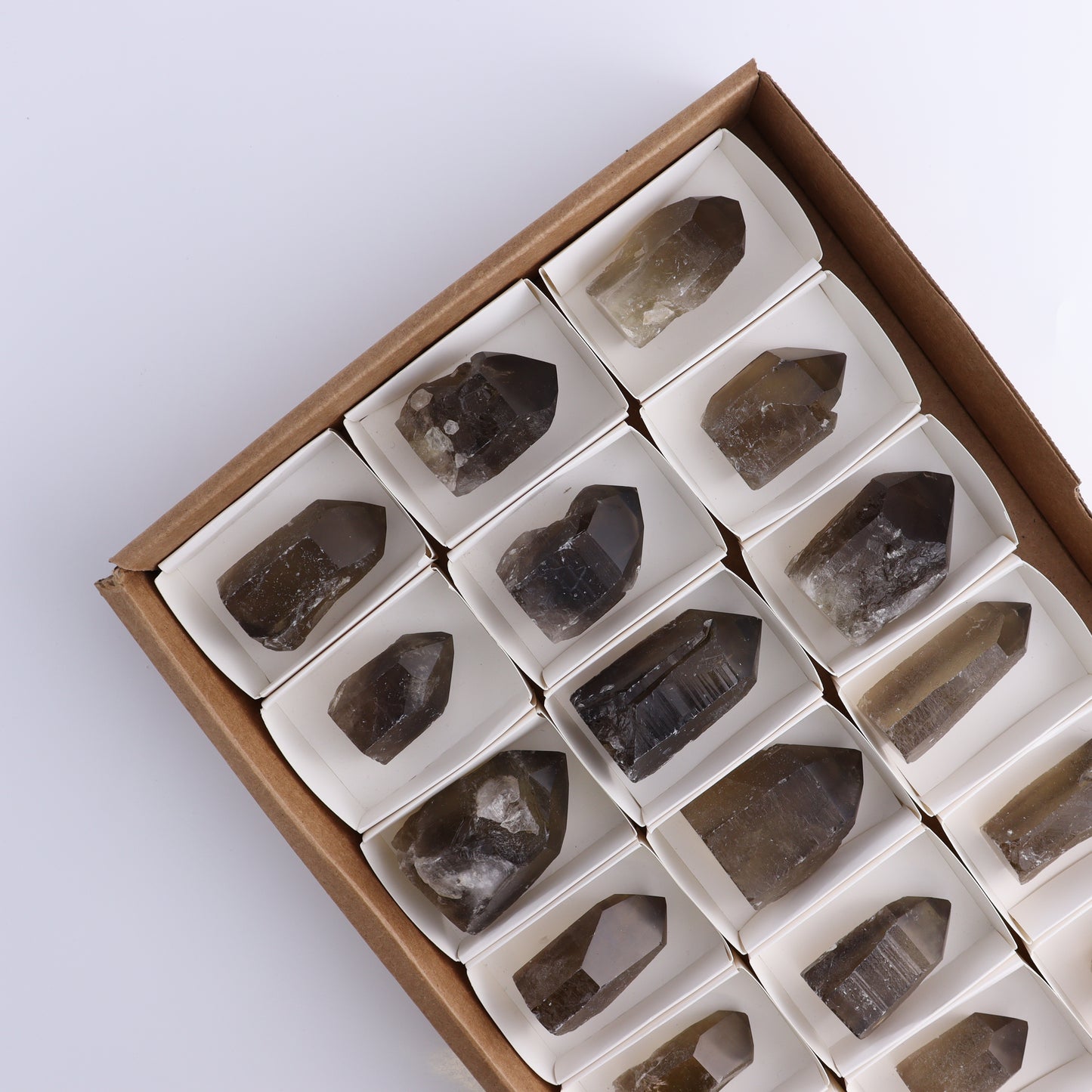 Smoky Quartz Polished Tops Set of 18 - Expert Wholesale and Supplier of Wholesale Crystals & Bulk Gemstones, ["Brazil","close_70","Points","Polished Tip","Quartz","Smoky Quartz"]