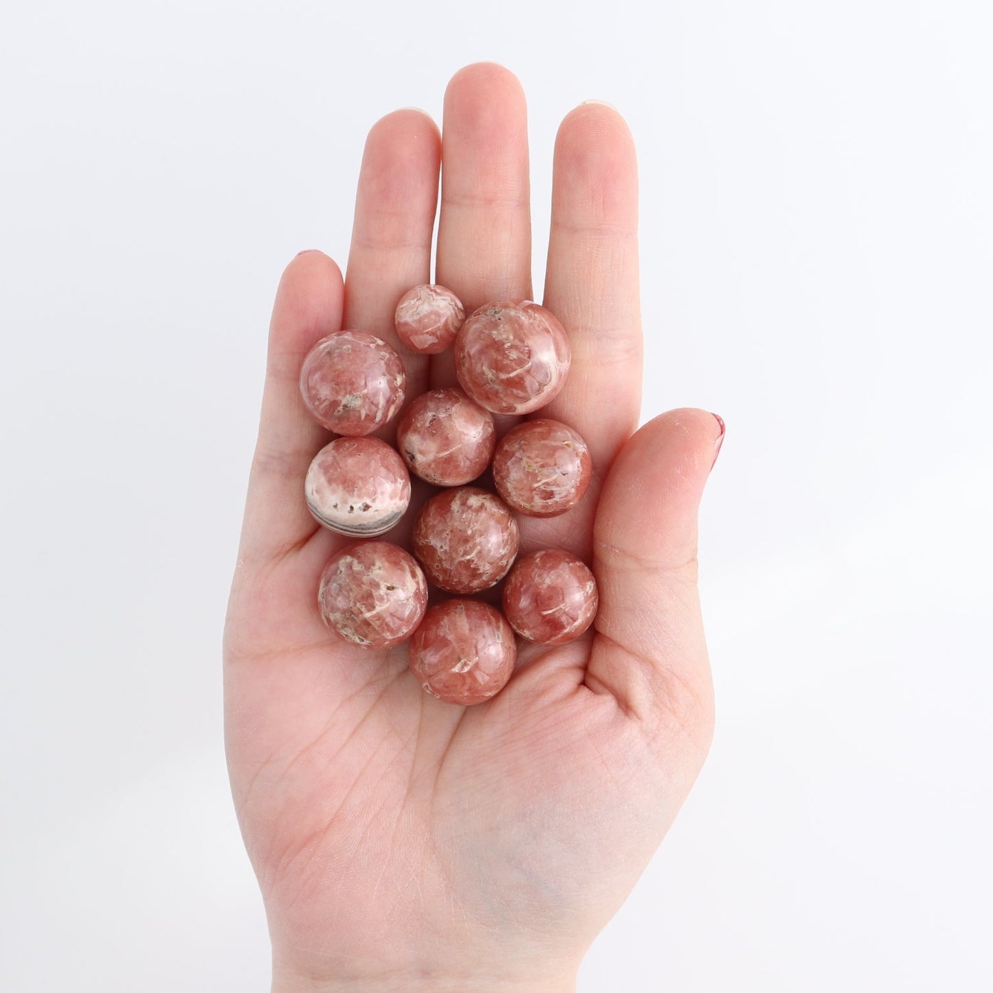 Rhodochrosite Spheres Set of 10 | Mi Esperanza Minerals | Supplier of Crystals and Onyx