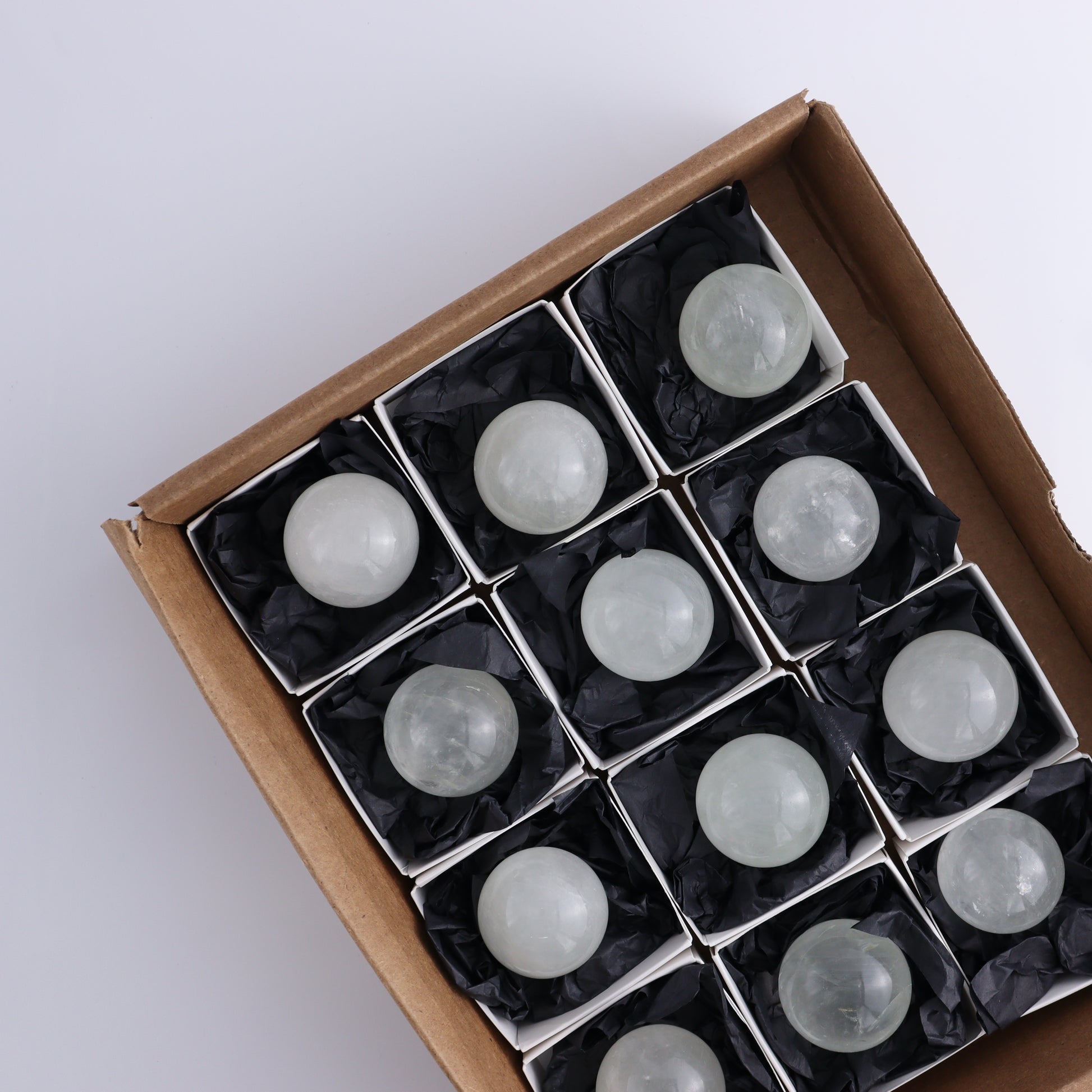 Optical Calcite Spheres Set of 12 - Expert Wholesale and Supplier of Wholesale Crystals & Bulk Gemstones, ["Calcite","Mexico","Optical Calcite","Spheres"]