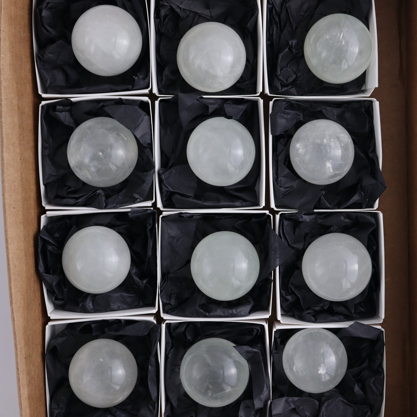 Optical Calcite Spheres Set of 12 - Expert Wholesale and Supplier of Wholesale Crystals & Bulk Gemstones, ["Calcite","Mexico","Optical Calcite","Spheres"]