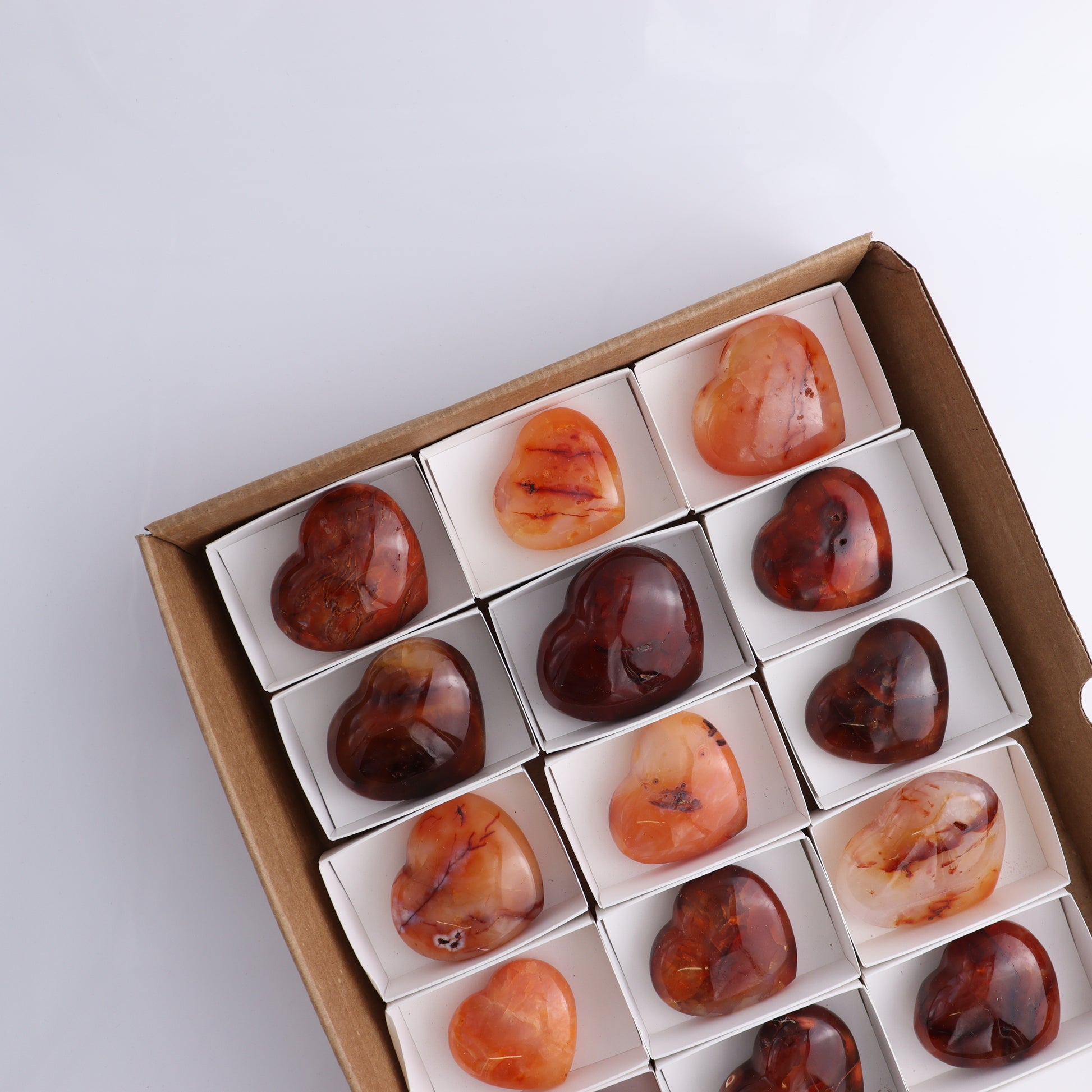 Carnelian Hearts Flat of 15 - Expert Wholesale and Supplier of Wholesale Crystals & Bulk Gemstones, ["carnelian","Hearts","Madagascar"]