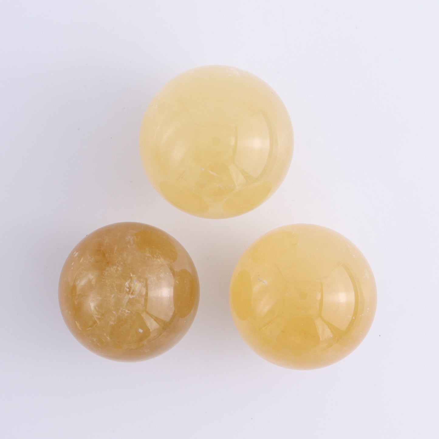 Calcite Spheres Set of 9 - Expert Wholesale and Supplier of Wholesale Crystals & Bulk Gemstones, ["Calcite","Mexico","Spheres"]