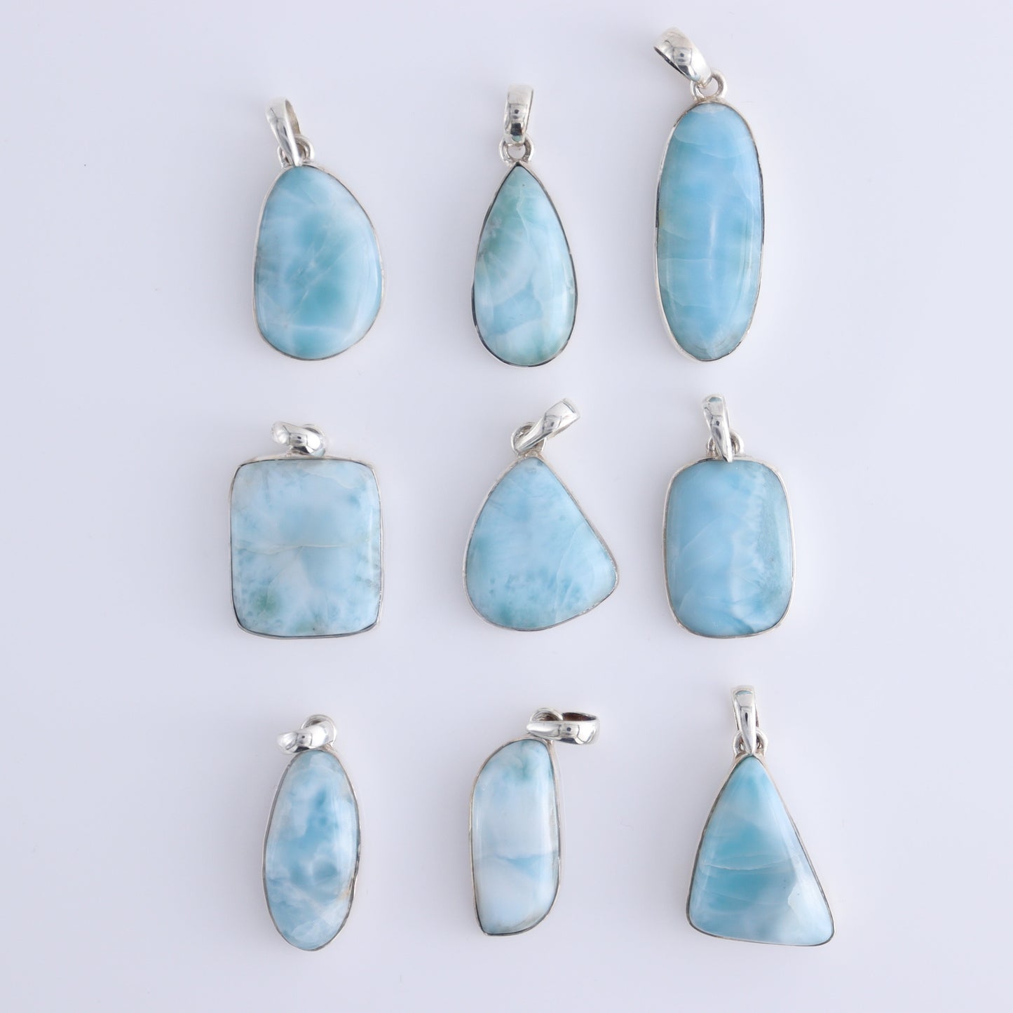 One Small Larimar Sterling Silver Pendant (chain not included) - Expert Wholesale and Supplier of Wholesale Crystals & Bulk Gemstones, ["Larimar","Pendant","sterling silver"]