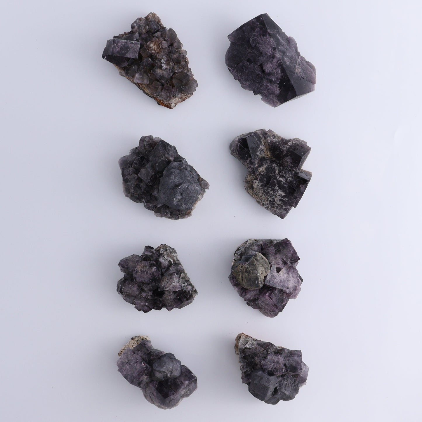 Fluorite Purple Rain Pocket Set of 8 - Expert Wholesale and Supplier of Wholesale Crystals & Bulk Gemstones, ["close_50","England","Fluorite","Purple Rain Pocket","Rough"]
