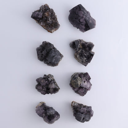 Fluorite Purple Rain Pocket Set of 8 - Expert Wholesale and Supplier of Wholesale Crystals & Bulk Gemstones, ["close_50","England","Fluorite","Purple Rain Pocket","Rough"]
