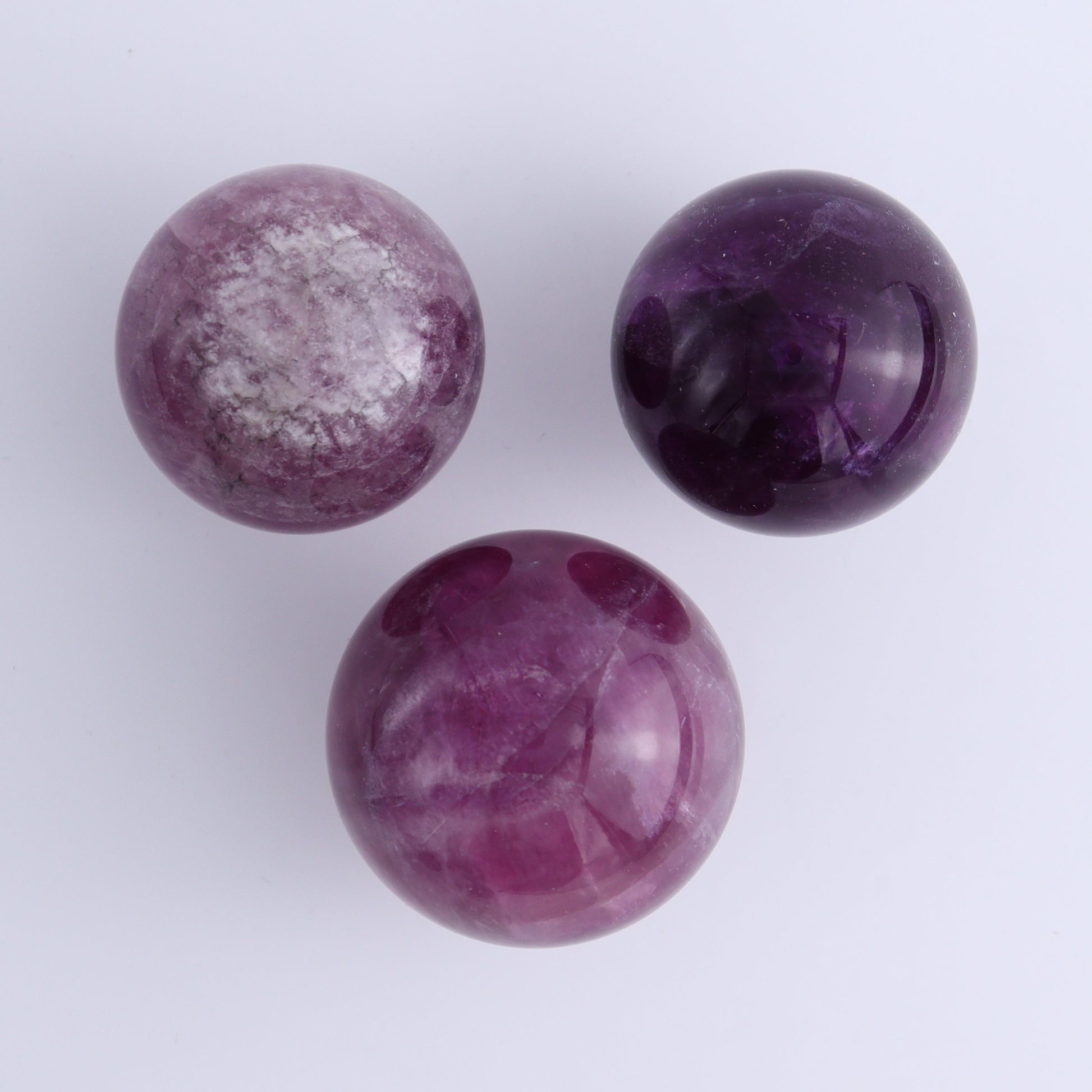 Purple Fluorite Spheres Set of 9 - Expert Wholesale and Supplier of Wholesale Crystals & Bulk Gemstones, ["Fluorite","Purple Fluorite","Spheres"]