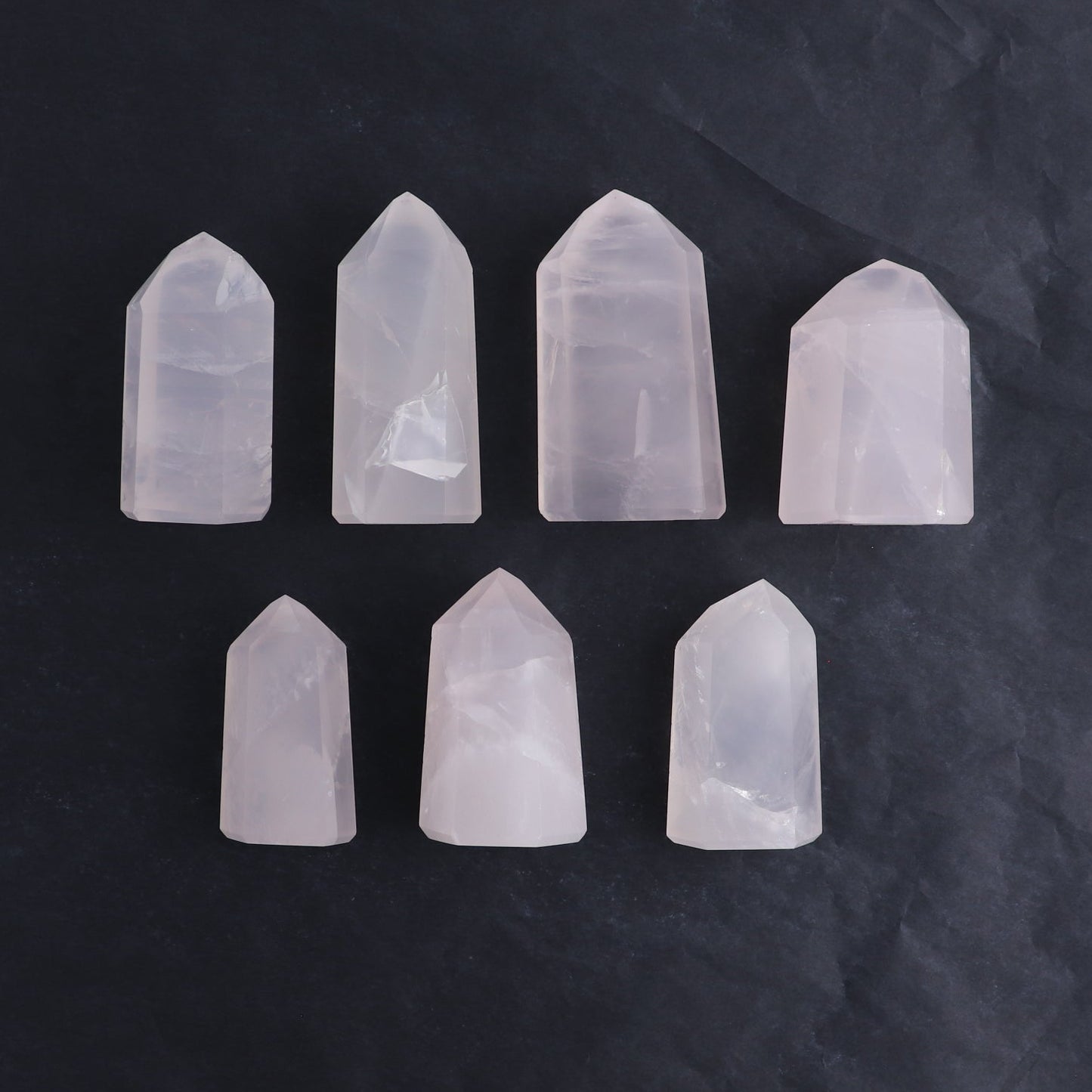 Imperfect Rose Quartz Towers Set of 7 - Expert Wholesale and Supplier of Wholesale Crystals & Bulk Gemstones, ["Brazil","Points","Quartz","Rose Quartz","Towers"]