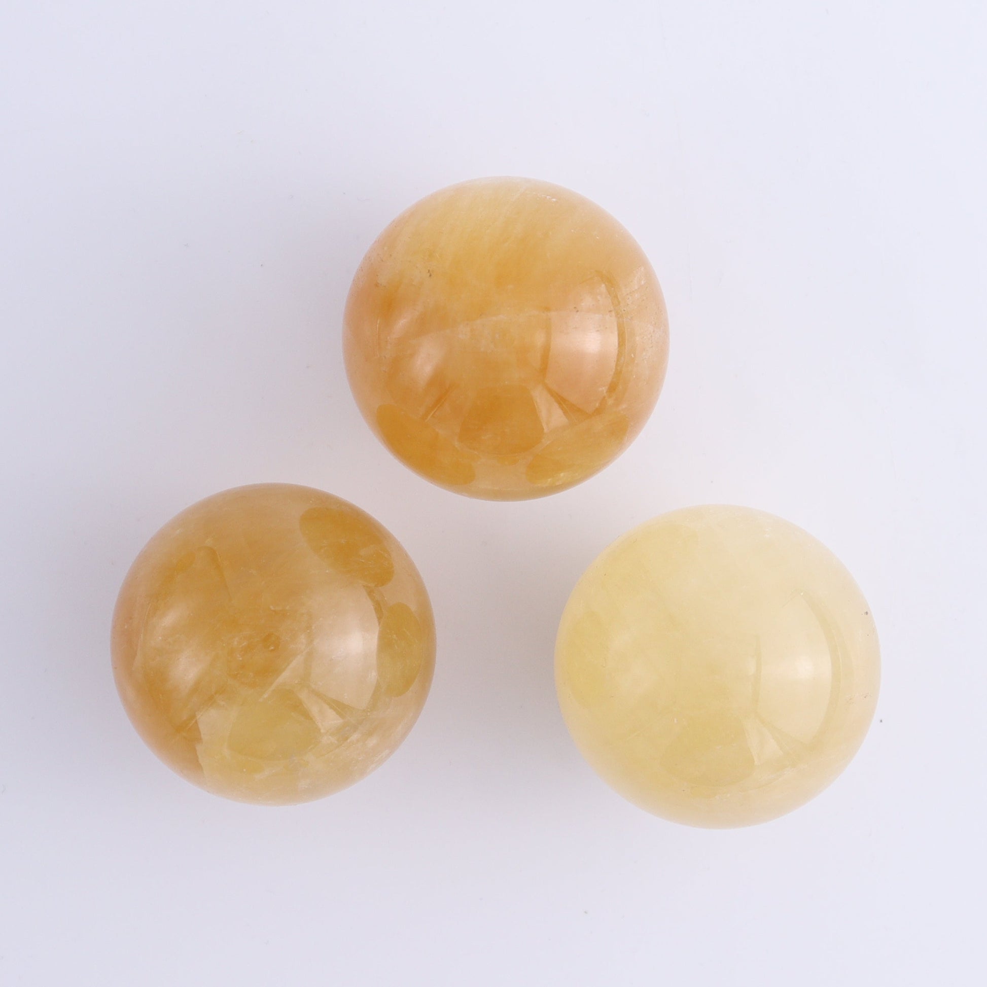 Calcite Spheres Set of 9 - Expert Wholesale and Supplier of Wholesale Crystals & Bulk Gemstones, ["Calcite","Mexico","Spheres"]