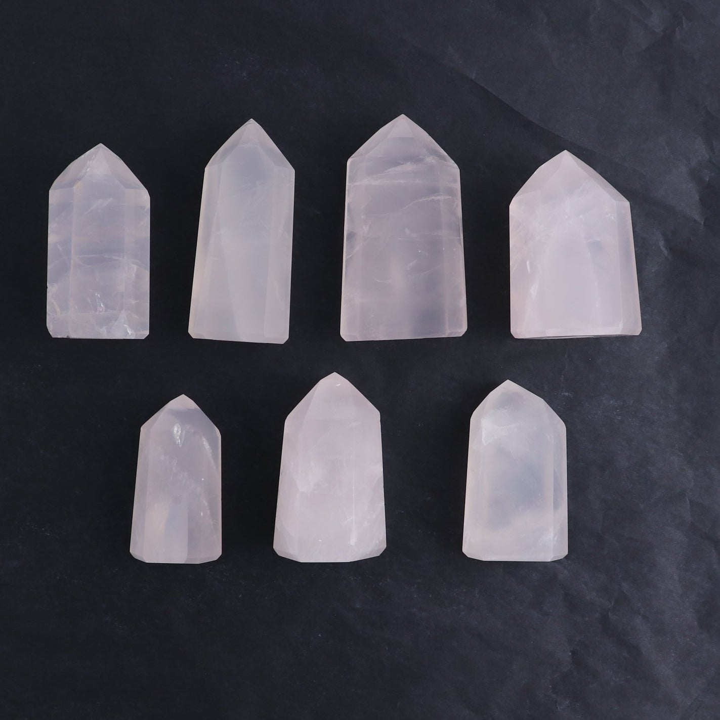 Imperfect Rose Quartz Towers Set of 7 - Expert Wholesale and Supplier of Wholesale Crystals & Bulk Gemstones, ["Brazil","Points","Quartz","Rose Quartz","Towers"]