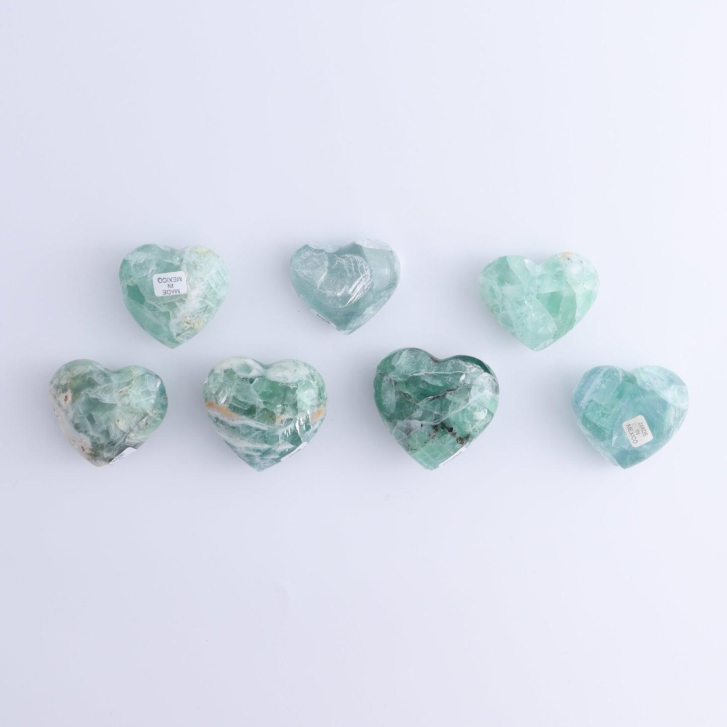 Fluorite Hearts Set of 7 - Expert Wholesale and Supplier of Wholesale Crystals & Bulk Gemstones, ["Fluorite","Hearts","Mexico"]