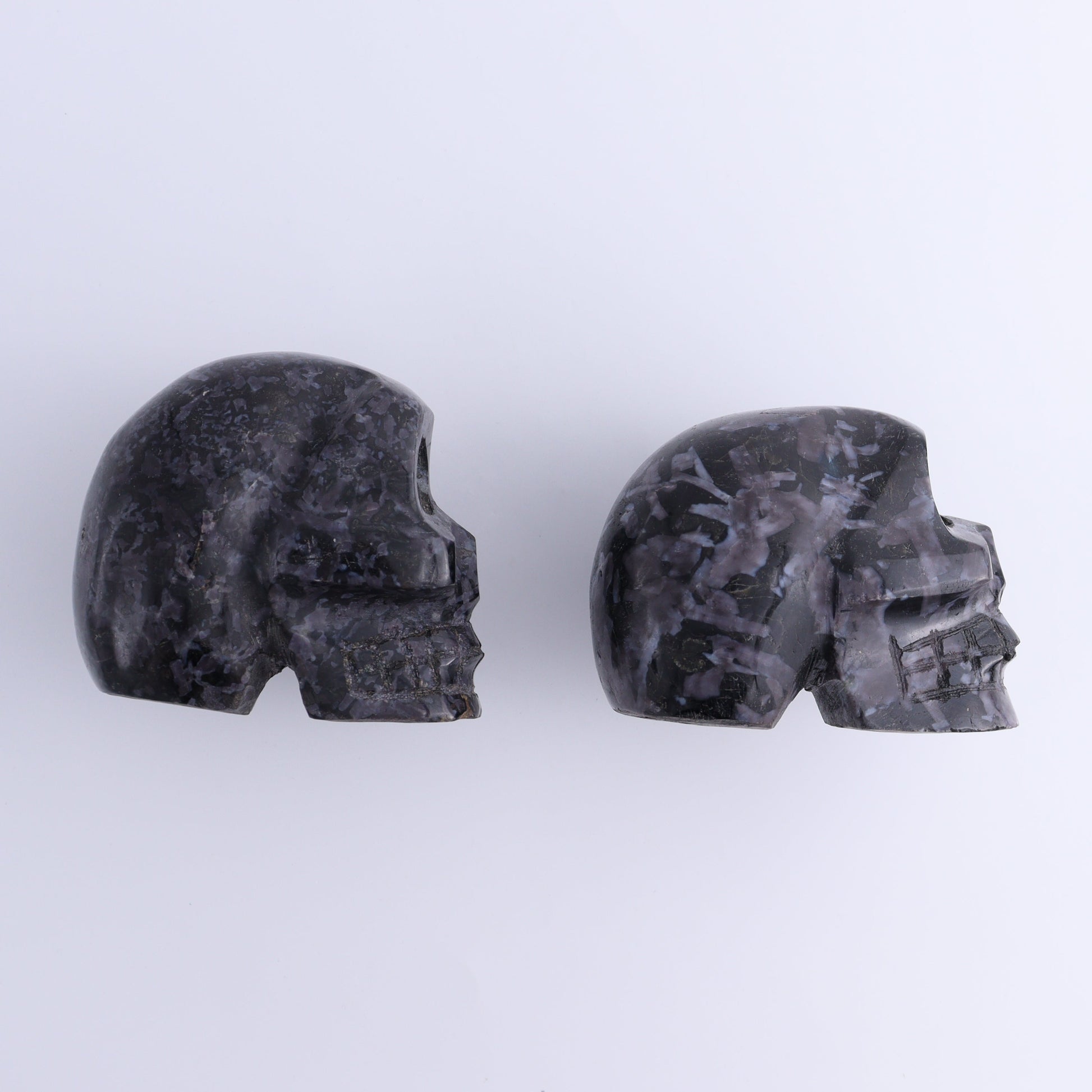 Indigo Gabbro Skulls Set of 2 - Expert Wholesale and Supplier of Wholesale Crystals & Bulk Gemstones, ["Indigo Gabbro","Madagascar","Skulls"]