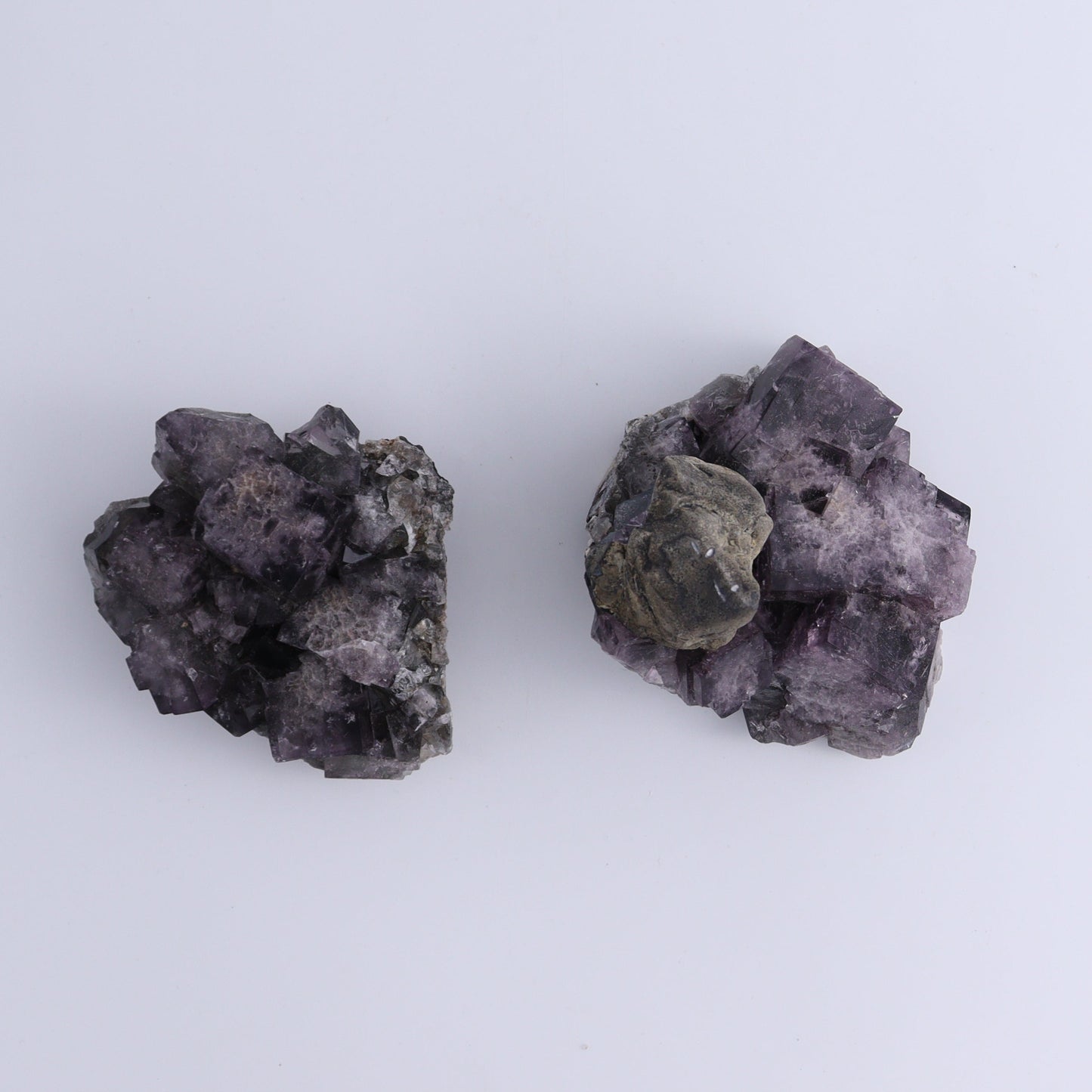 Fluorite Purple Rain Pocket Set of 8 - Expert Wholesale and Supplier of Wholesale Crystals & Bulk Gemstones, ["close_50","England","Fluorite","Purple Rain Pocket","Rough"]