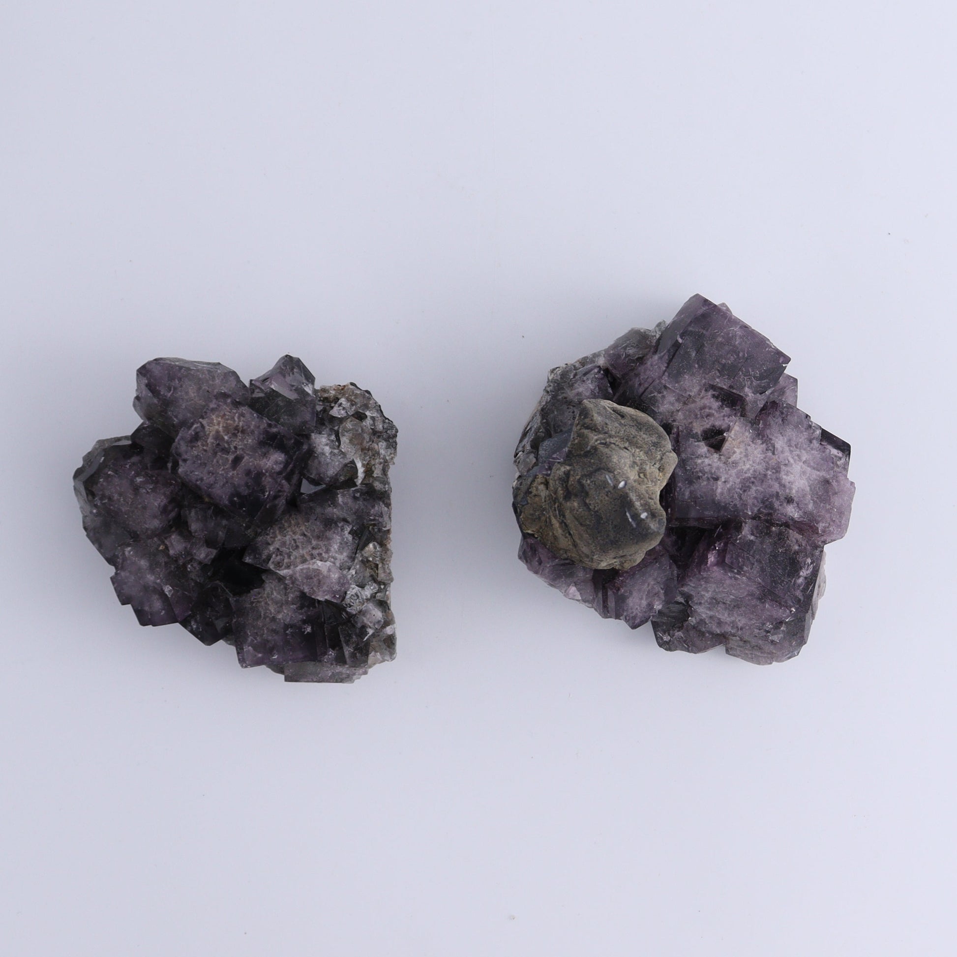 Fluorite Purple Rain Pocket Set of 8 - Expert Wholesale and Supplier of Wholesale Crystals & Bulk Gemstones, ["close_50","England","Fluorite","Purple Rain Pocket","Rough"]