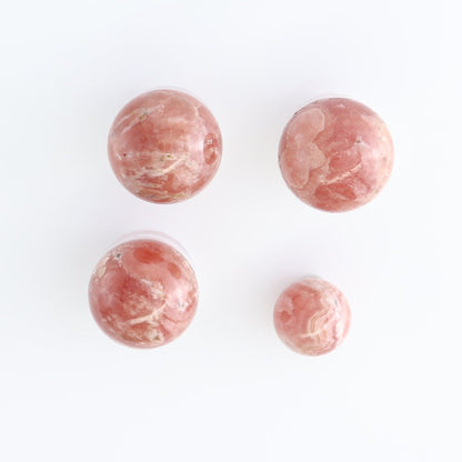 Rhodochrosite Spheres Set of 10 | Mi Esperanza Minerals | Supplier of Crystals and Onyx