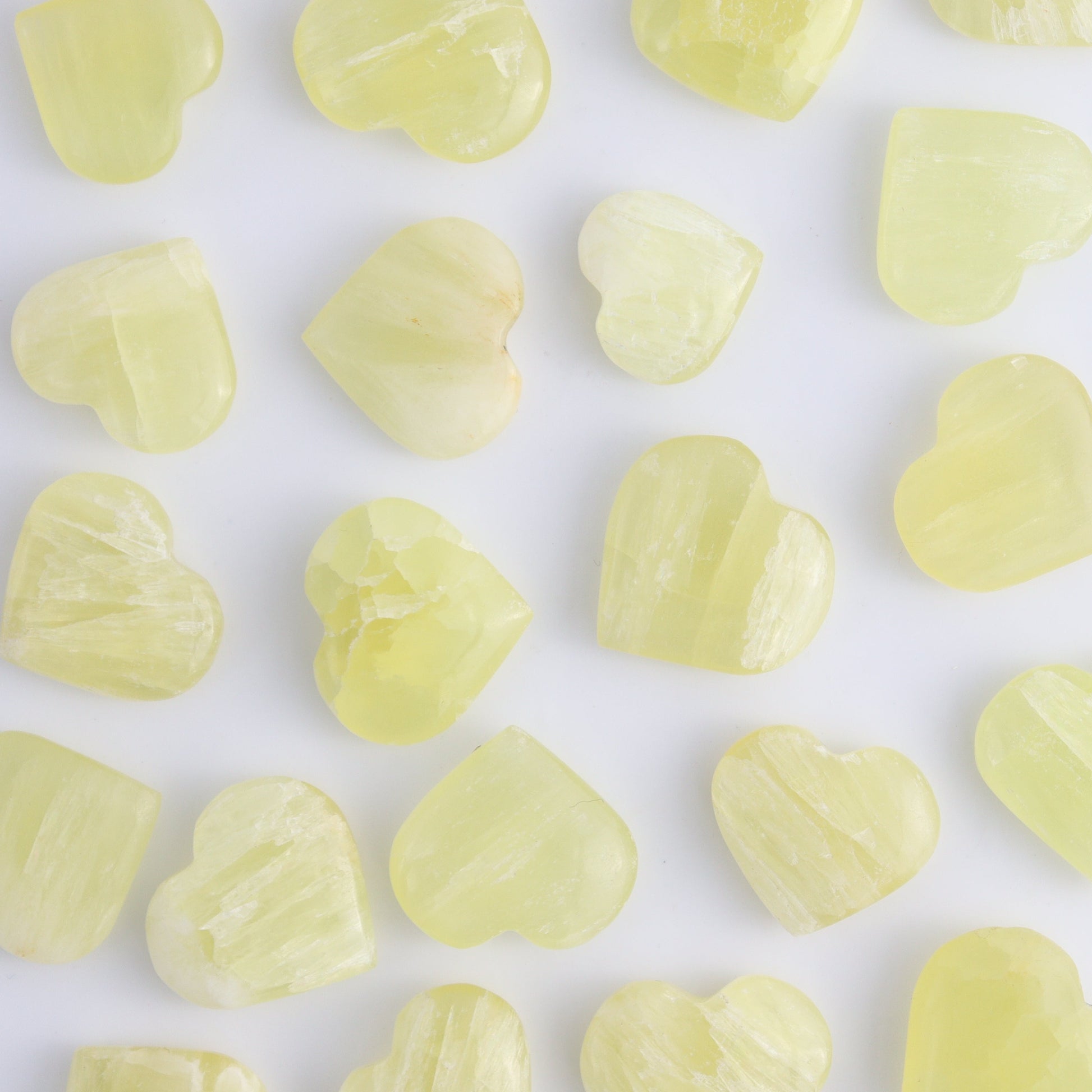 One Lemon Calcite Little Heart - Expert Wholesale and Supplier of Wholesale Crystals & Bulk Gemstones, ["Calcite","Hearts","Lemon Calcite","Pakistan"]