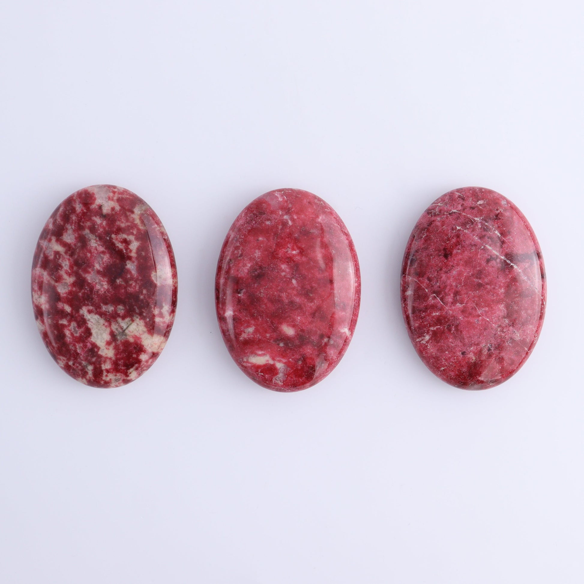 Thulite Palm Stones Set of 3 - Expert Wholesale and Supplier of Wholesale Crystals & Bulk Gemstones, ["Palm Stones","thulite"]