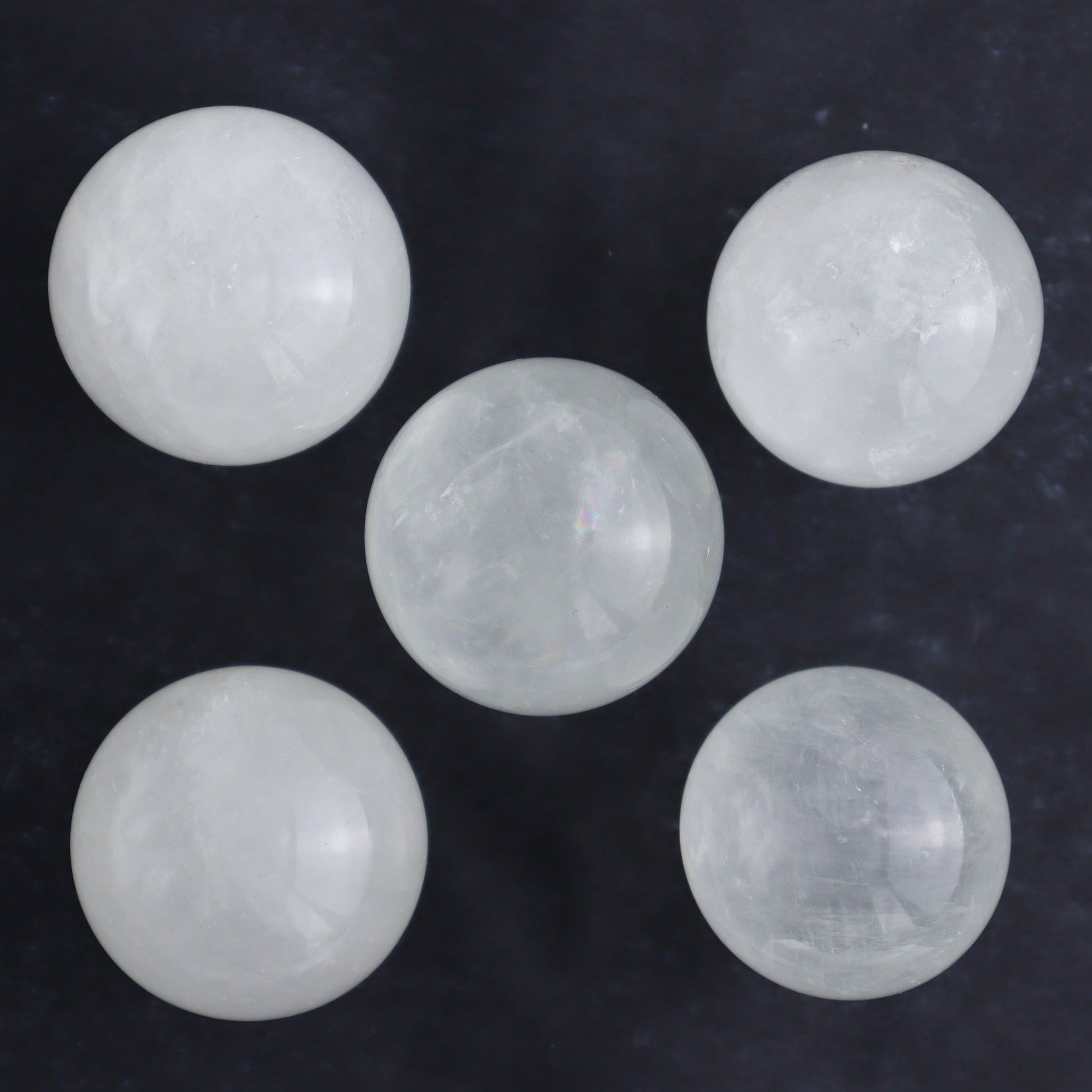 Optical Calcite Spheres Set of 12 - Expert Wholesale and Supplier of Wholesale Crystals & Bulk Gemstones, ["Calcite","Mexico","Optical Calcite","Spheres"]