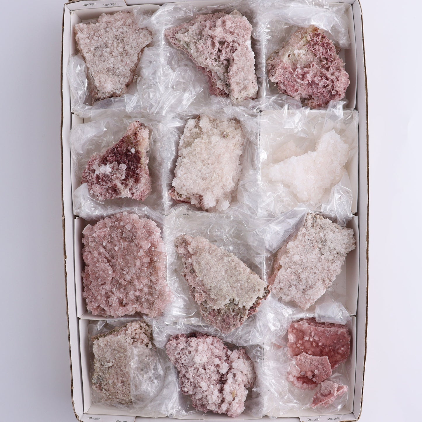 Pink Halite Set of 12 - Expert Wholesale and Supplier of Wholesale Crystals & Bulk Gemstones, ["close_50","Flats","Halite","Pink Halite","United States"]