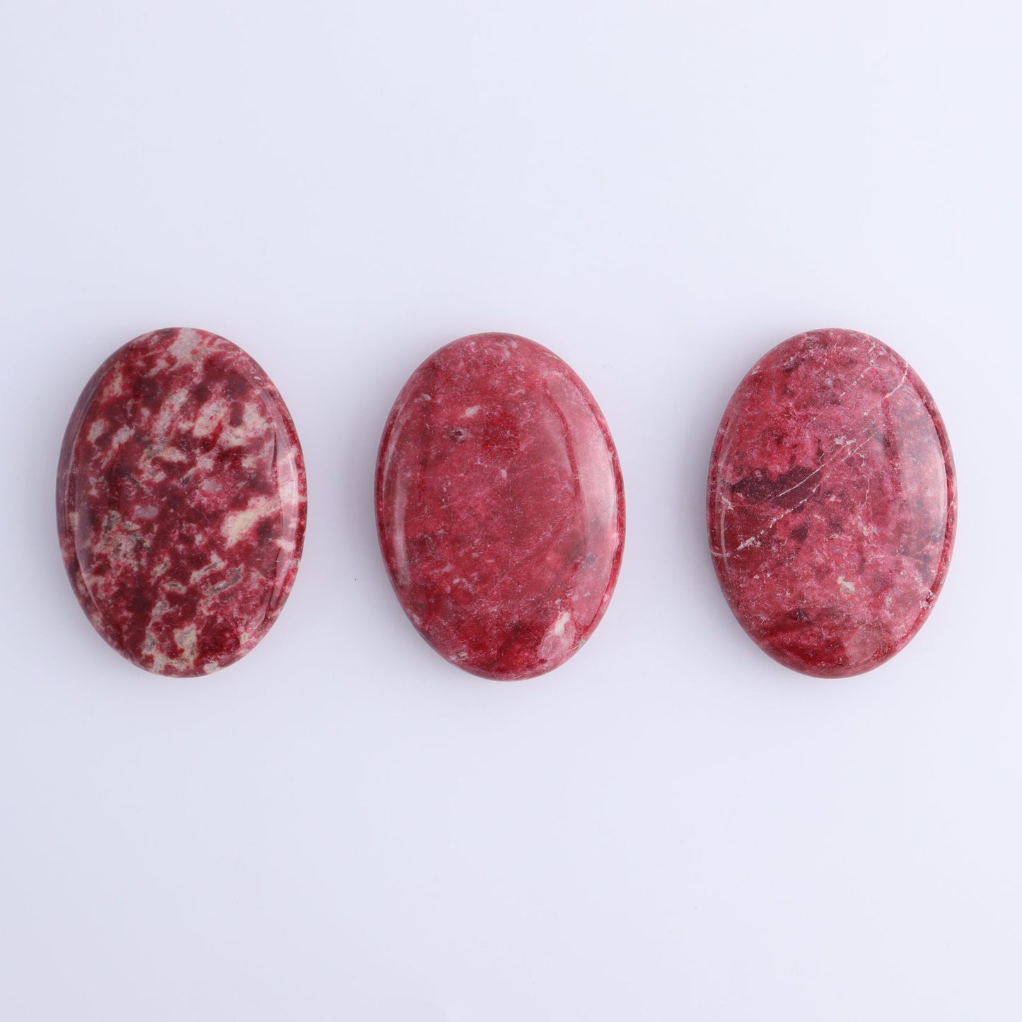 Thulite Palm Stones Set of 3 - Expert Wholesale and Supplier of Wholesale Crystals & Bulk Gemstones, ["Palm Stones","thulite"]