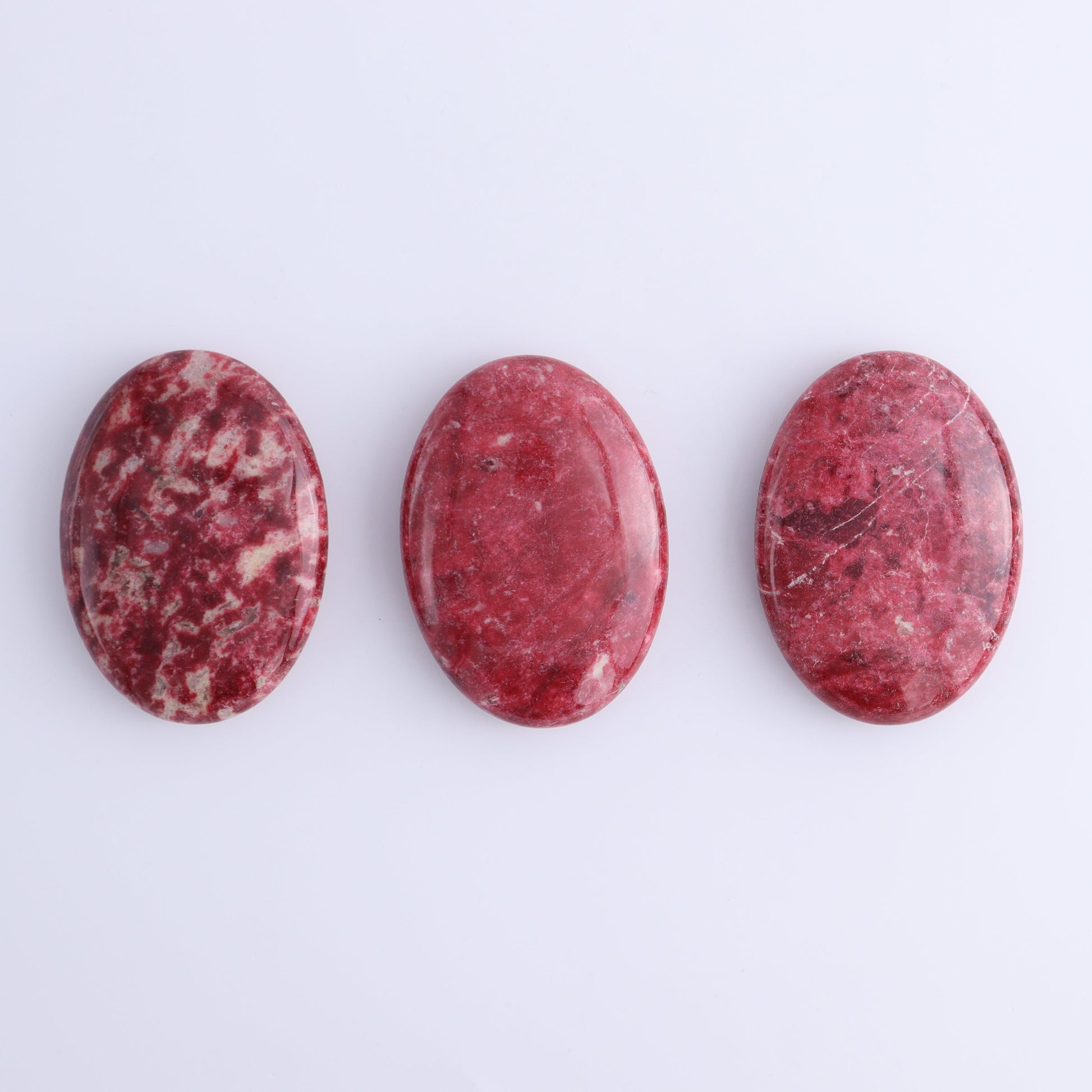 Thulite Palm Stones Set of 3 - Expert Wholesale and Supplier of Wholesale Crystals & Bulk Gemstones, ["Palm Stones","thulite"]