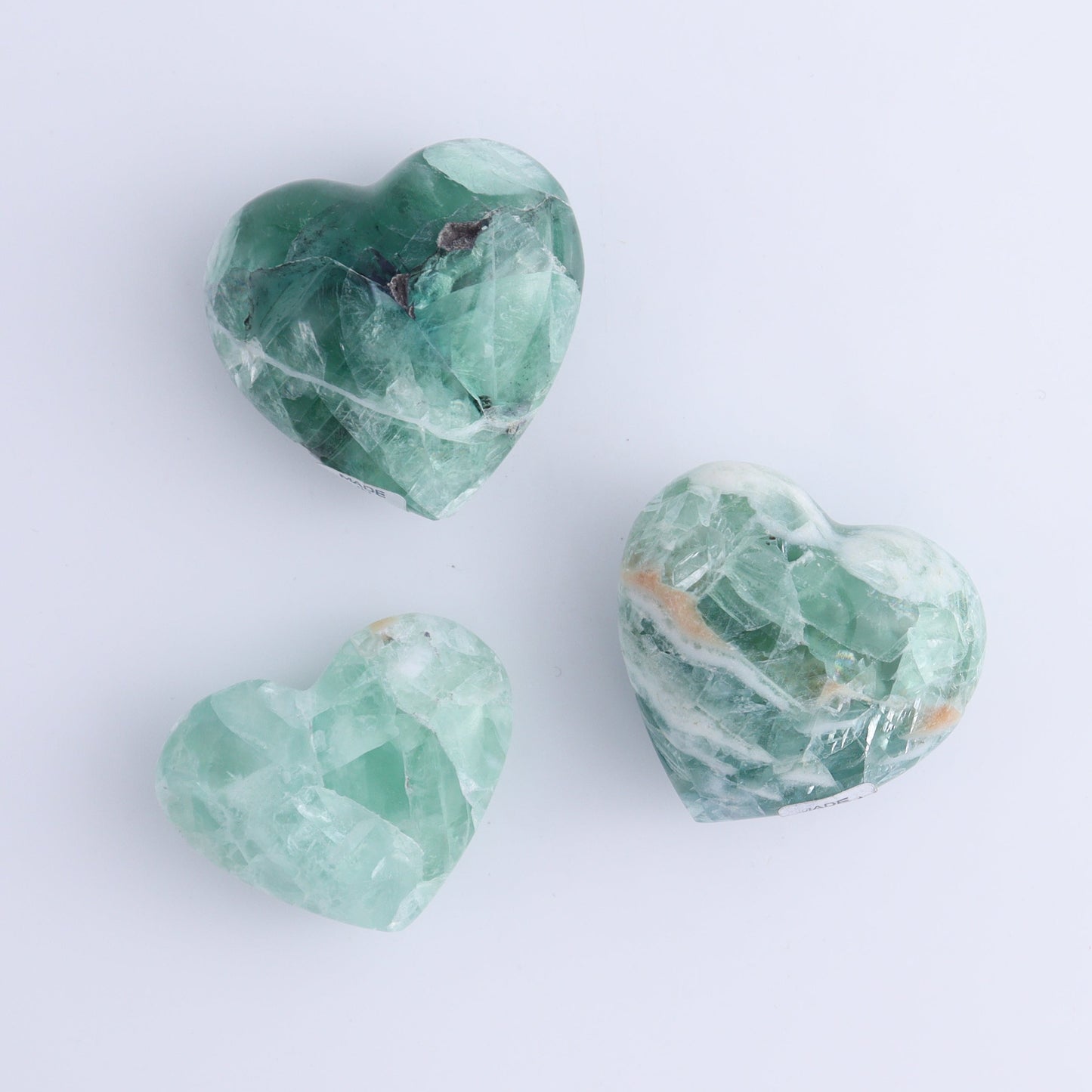 Fluorite Hearts Set of 7 - Expert Wholesale and Supplier of Wholesale Crystals & Bulk Gemstones, ["Fluorite","Hearts","Mexico"]