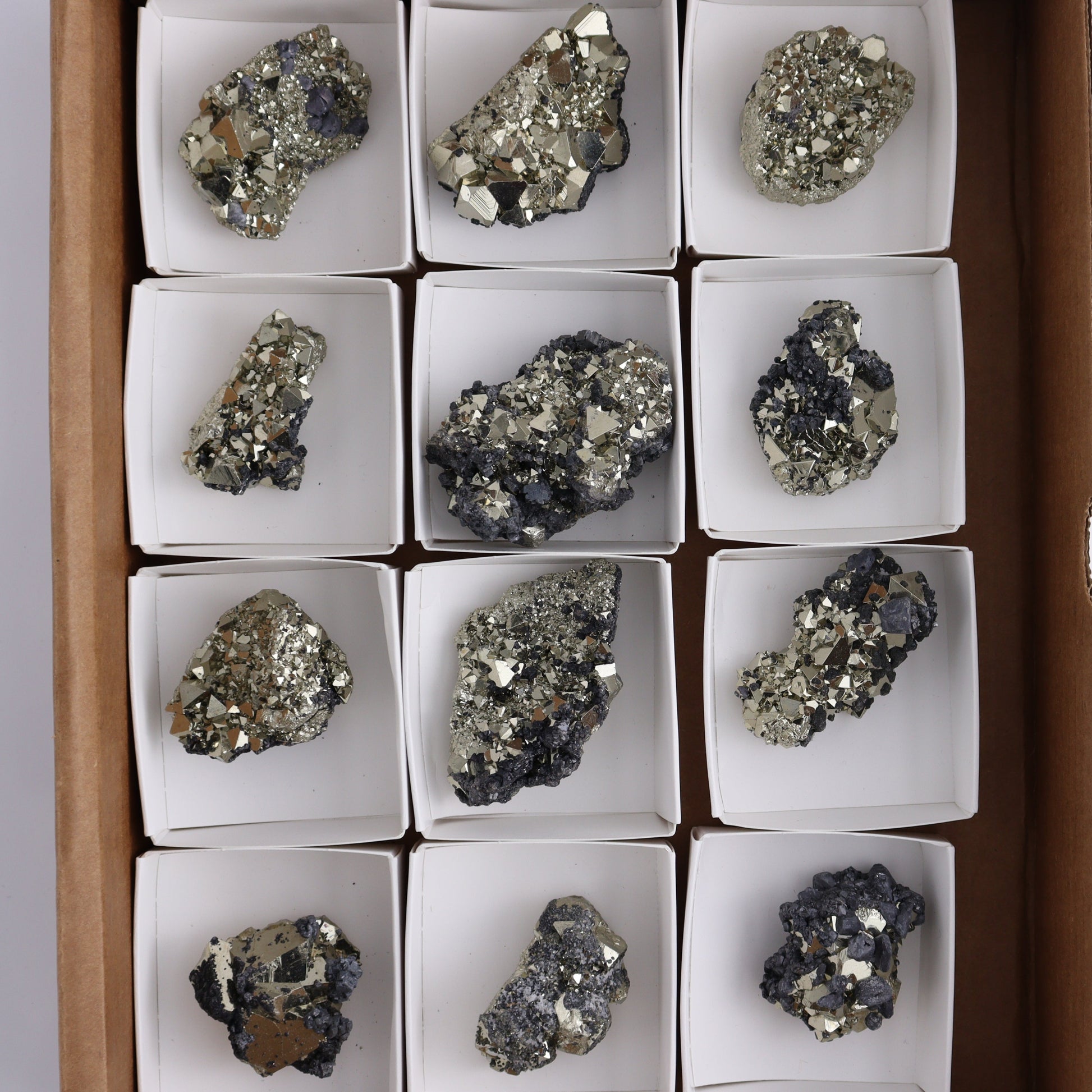 Octahedral Pyrite Clusters Set of 12 - Expert Wholesale and Supplier of Wholesale Crystals & Bulk Gemstones, ["Clusters","Octahedral Pyrite","Peru","Pyrite"]