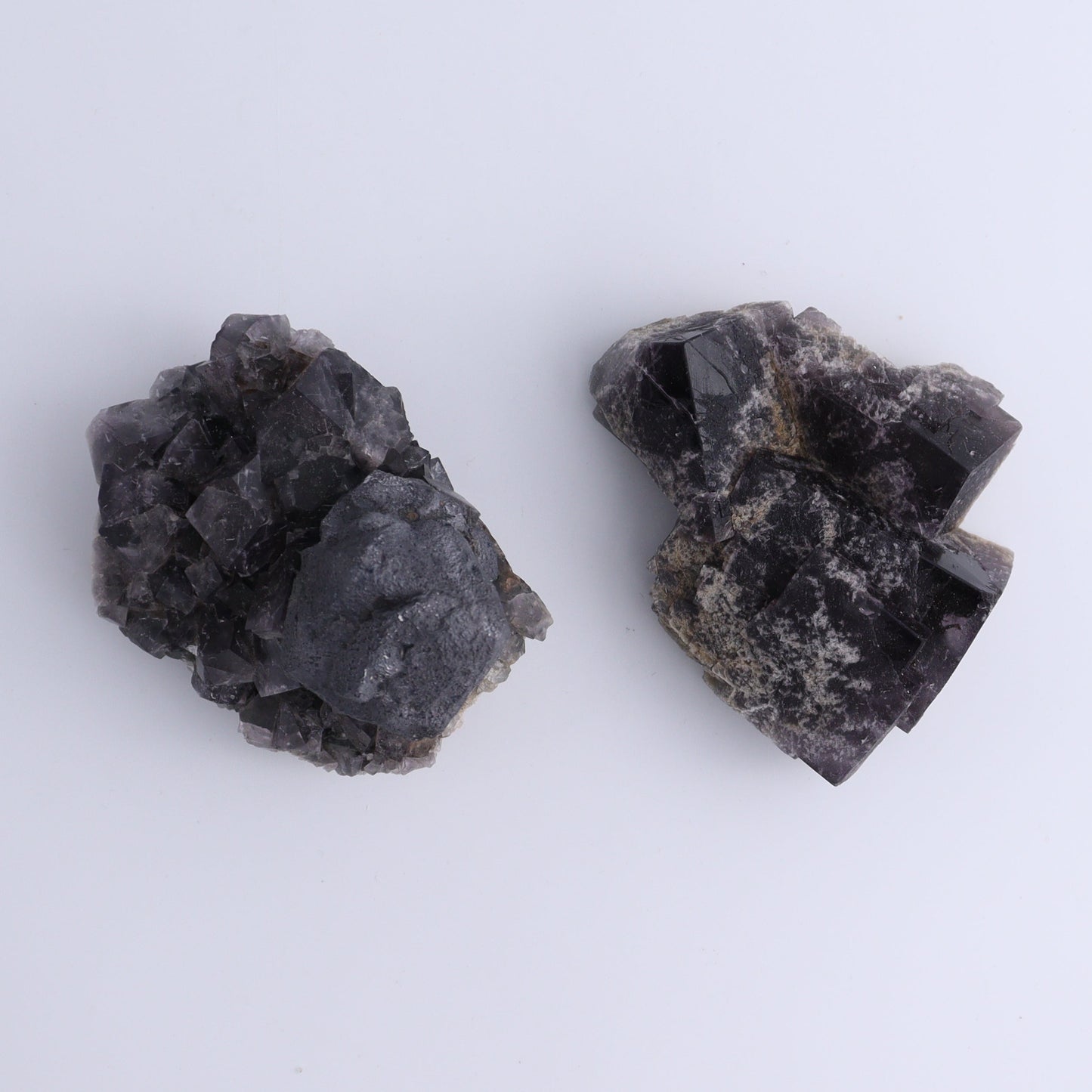 Fluorite Purple Rain Pocket Set of 8 - Expert Wholesale and Supplier of Wholesale Crystals & Bulk Gemstones, ["close_50","England","Fluorite","Purple Rain Pocket","Rough"]