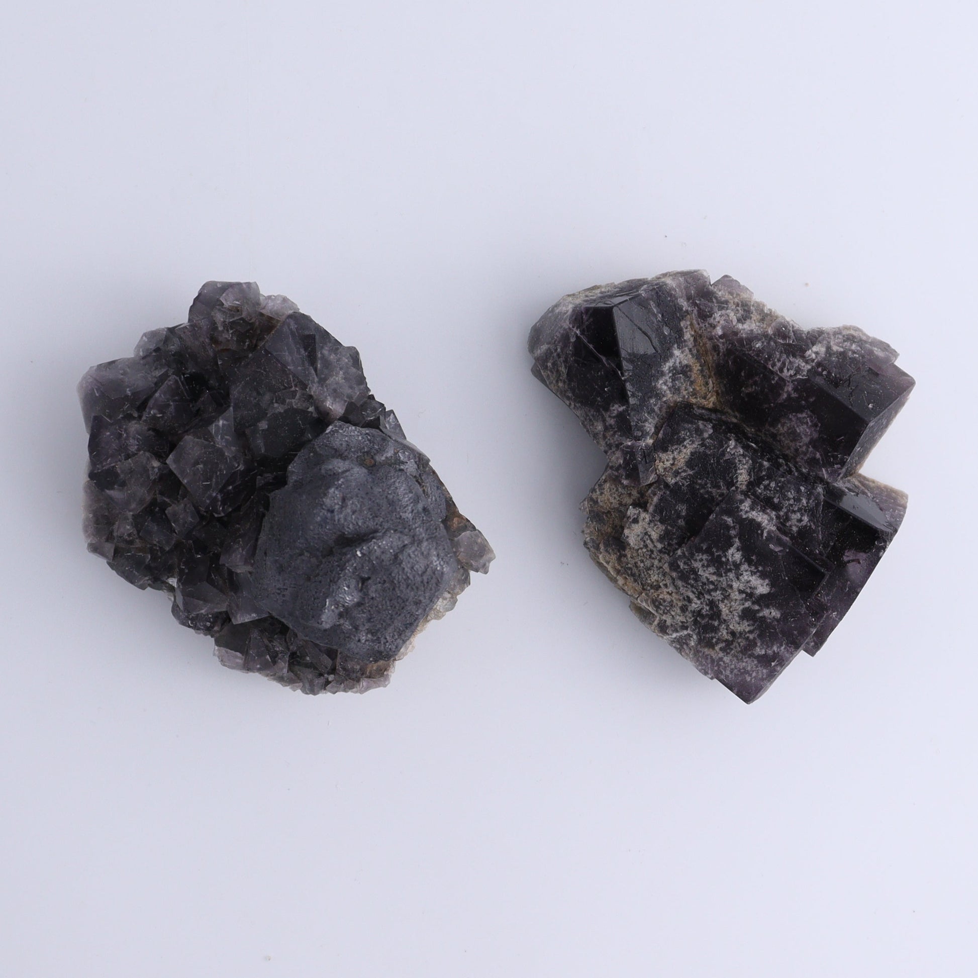 Fluorite Purple Rain Pocket Set of 8 - Expert Wholesale and Supplier of Wholesale Crystals & Bulk Gemstones, ["close_50","England","Fluorite","Purple Rain Pocket","Rough"]