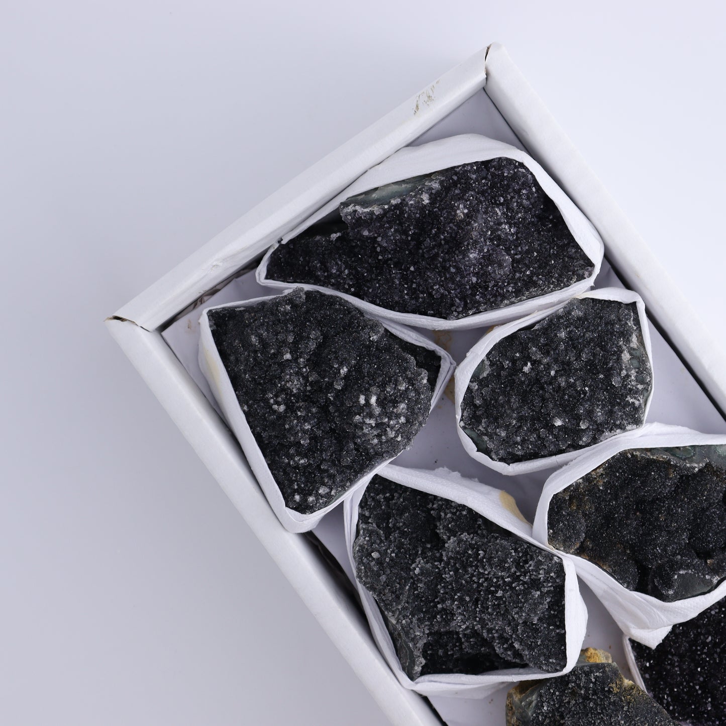 Uruguay Black Amethyst Flat of 7 - Expert Wholesale and Supplier of Wholesale Crystals & Bulk Gemstones, ["Amethyst","Black Amethyst","Clusters","Uruguay"]