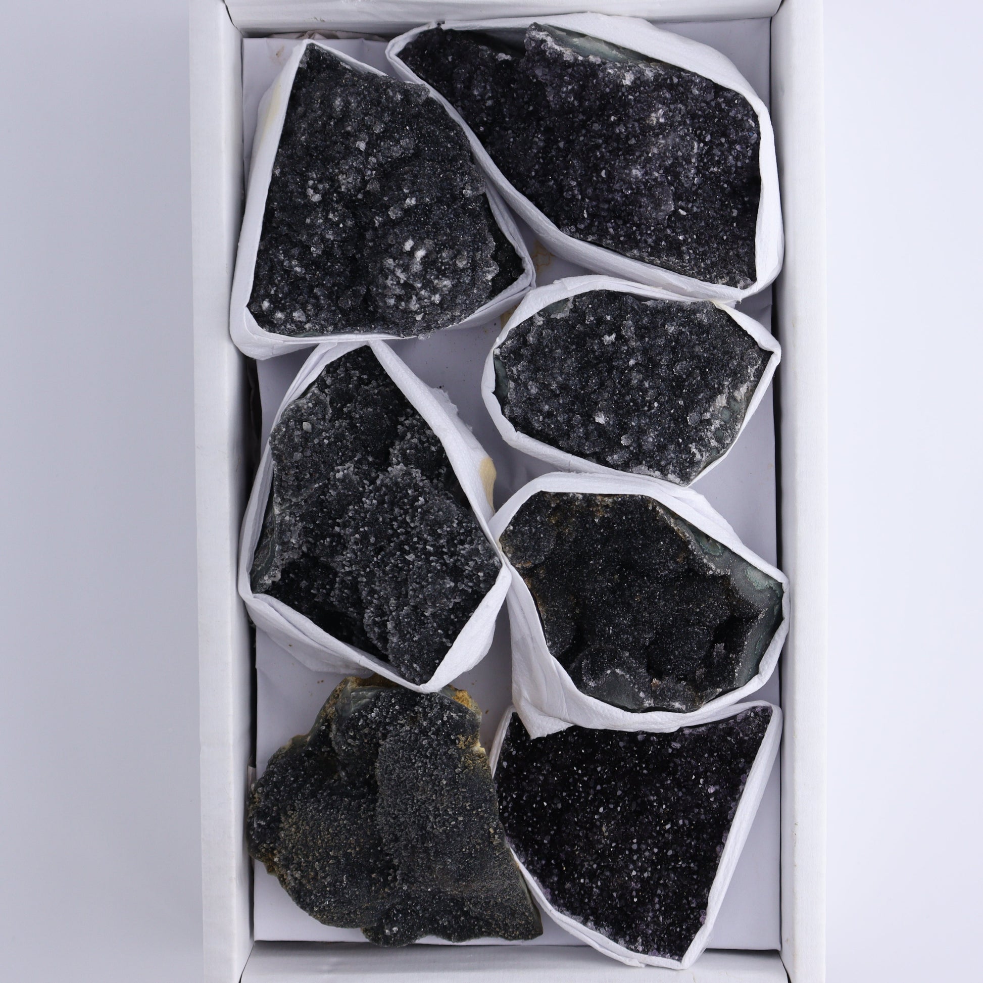 Uruguay Black Amethyst Flat of 7 - Expert Wholesale and Supplier of Wholesale Crystals & Bulk Gemstones, ["Amethyst","Black Amethyst","Clusters","Uruguay"]