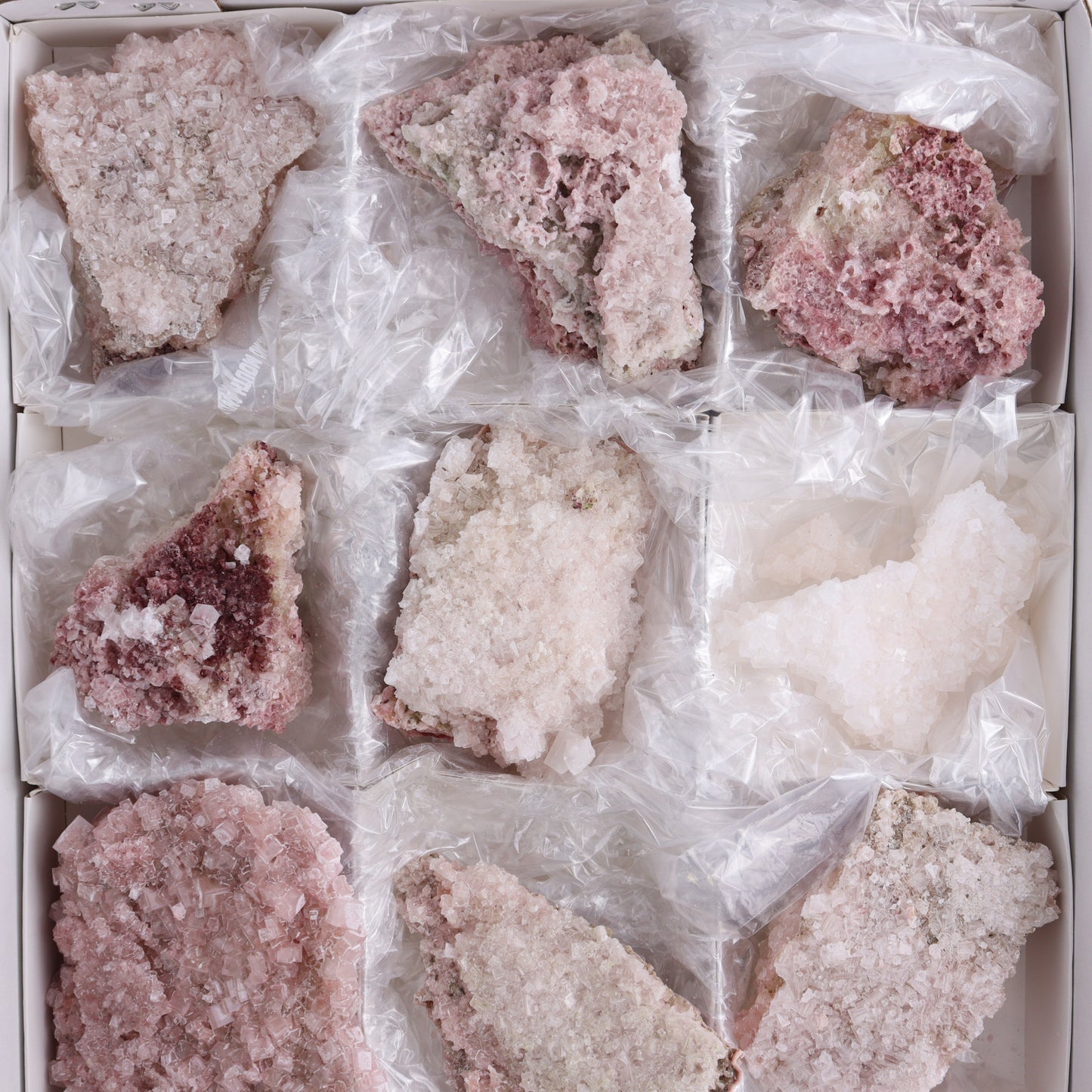 Pink Halite Set of 12 - Expert Wholesale and Supplier of Wholesale Crystals & Bulk Gemstones, ["close_50","Flats","Halite","Pink Halite","United States"]