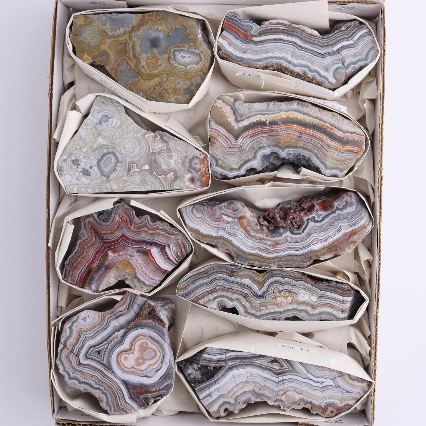 *sold Crazy Lace Agate Flat of 9 - Expert Wholesale and Supplier of Wholesale Crystals & Bulk Gemstones, ["Crazy Lace Agate","Mexico"]