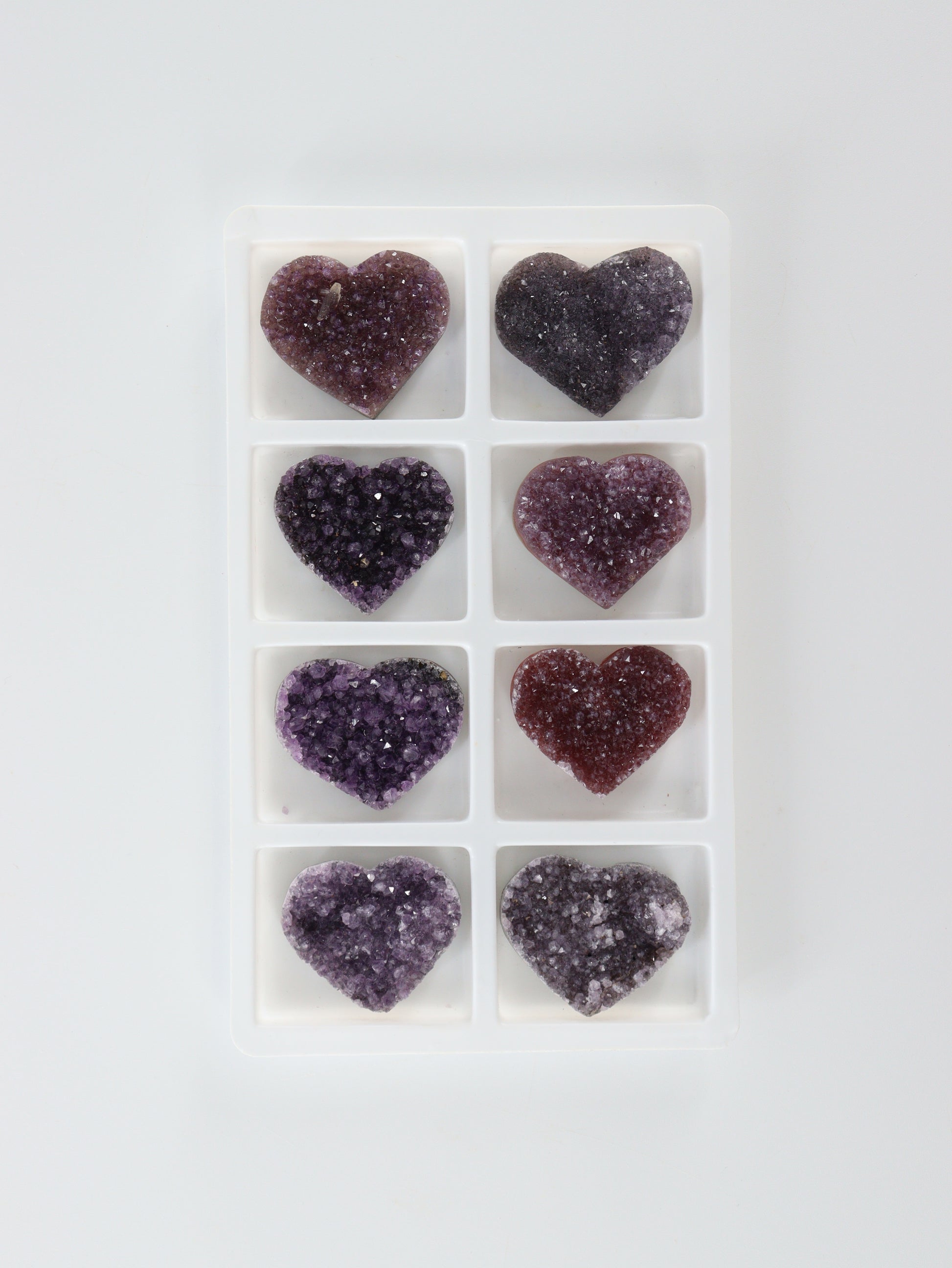 Amethyst Hearts Set of 8 - Expert Supplier of Wholesale Crystals & Bulk Gemstones