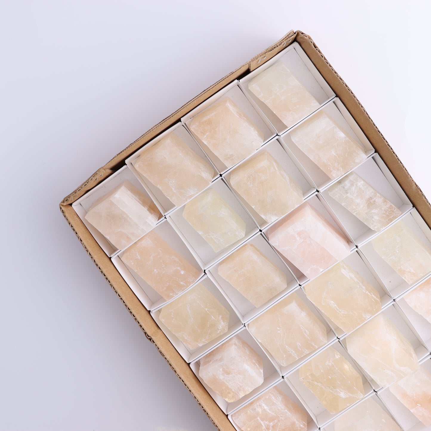 Pink Optical Calcite (Fluorescent) Set of 24 - Expert Wholesale and Supplier of Wholesale Crystals & Bulk Gemstones, ["Calcite","Mexico","Optical Calcite"]