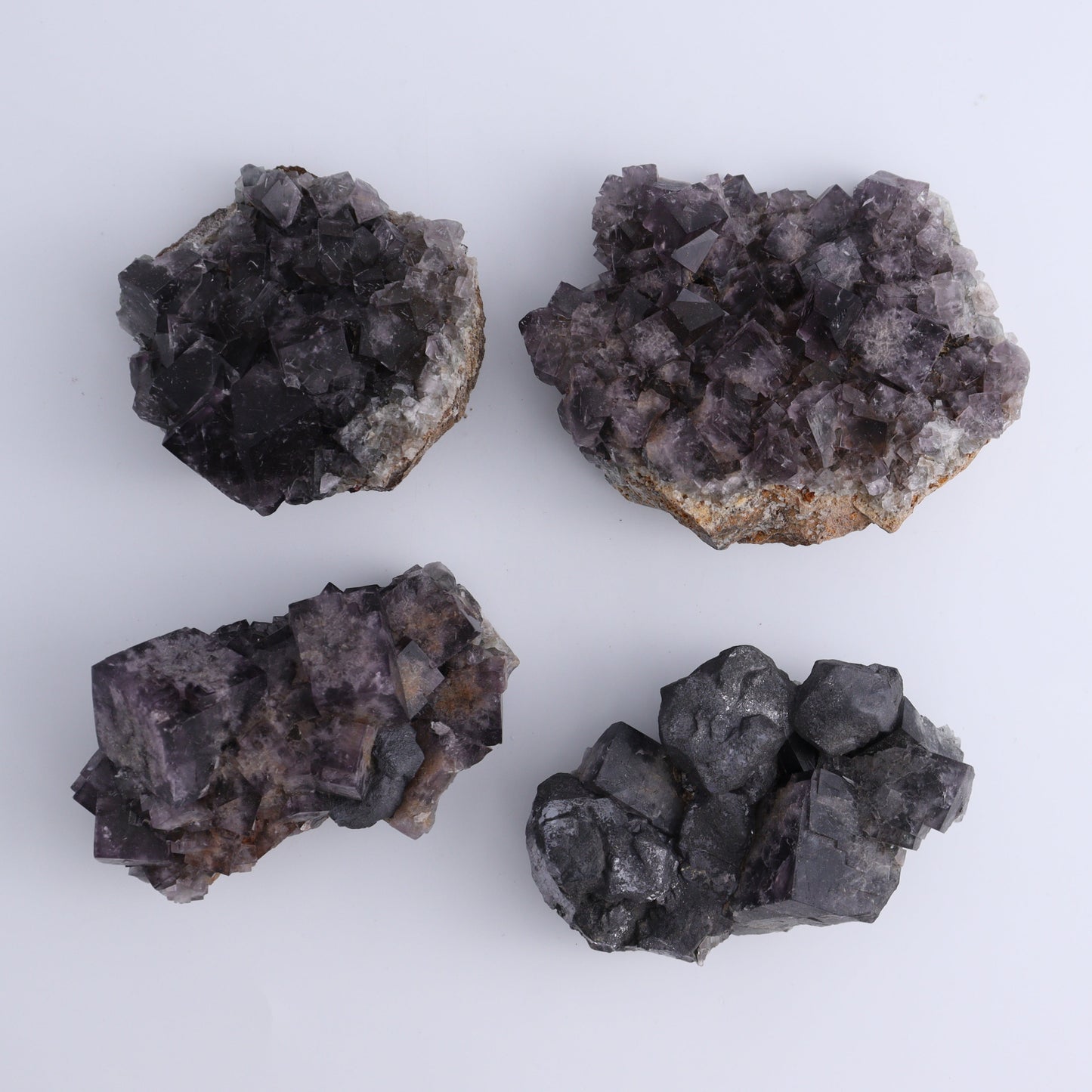 Fluorite Purple Rain Pocket Set of 8 - Expert Wholesale and Supplier of Wholesale Crystals & Bulk Gemstones, ["close_50","England","Fluorite","Purple Rain Pocket","Rough"]