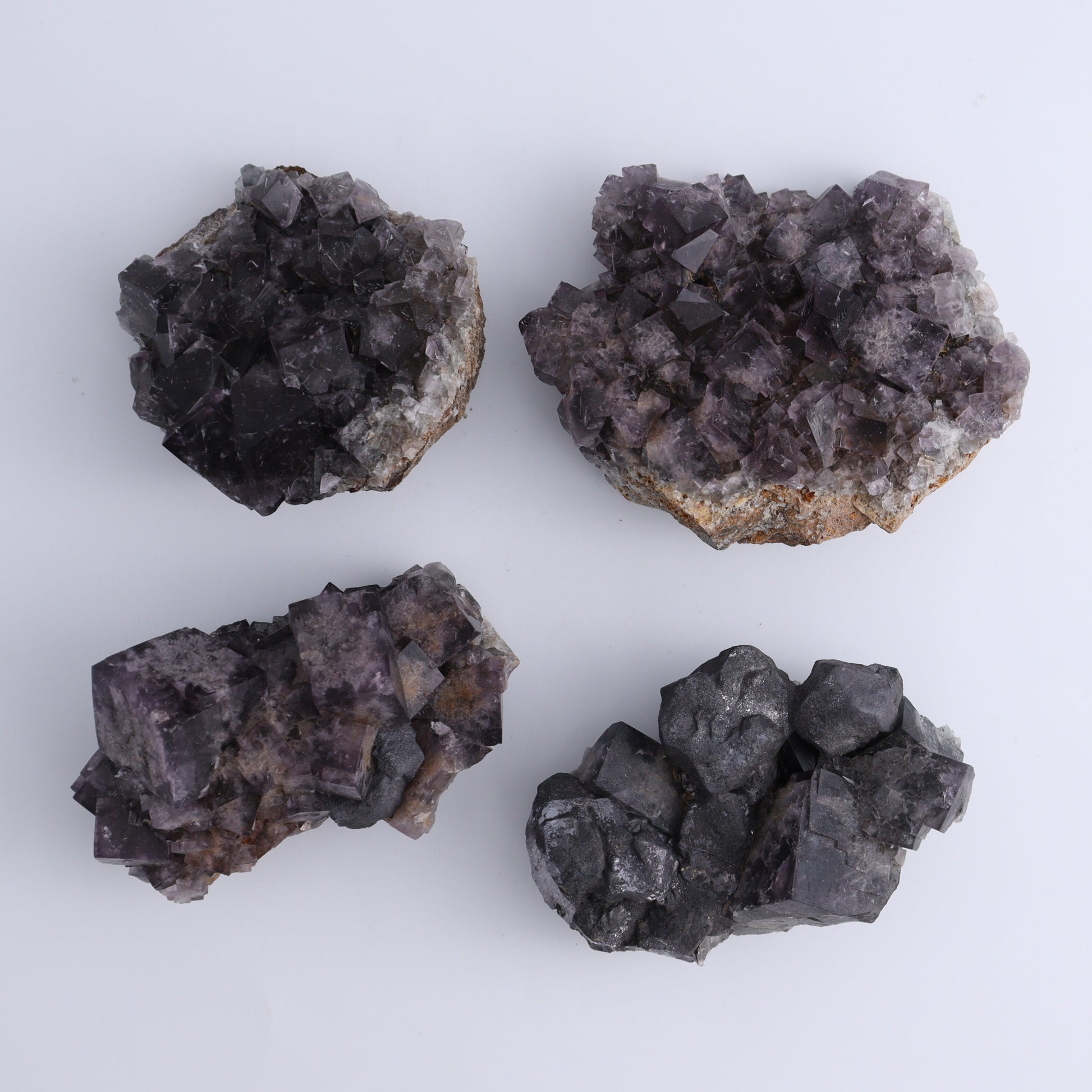 Fluorite Purple Rain Pocket Set of 8 - Expert Wholesale and Supplier of Wholesale Crystals & Bulk Gemstones, ["close_50","England","Fluorite","Purple Rain Pocket","Rough"]