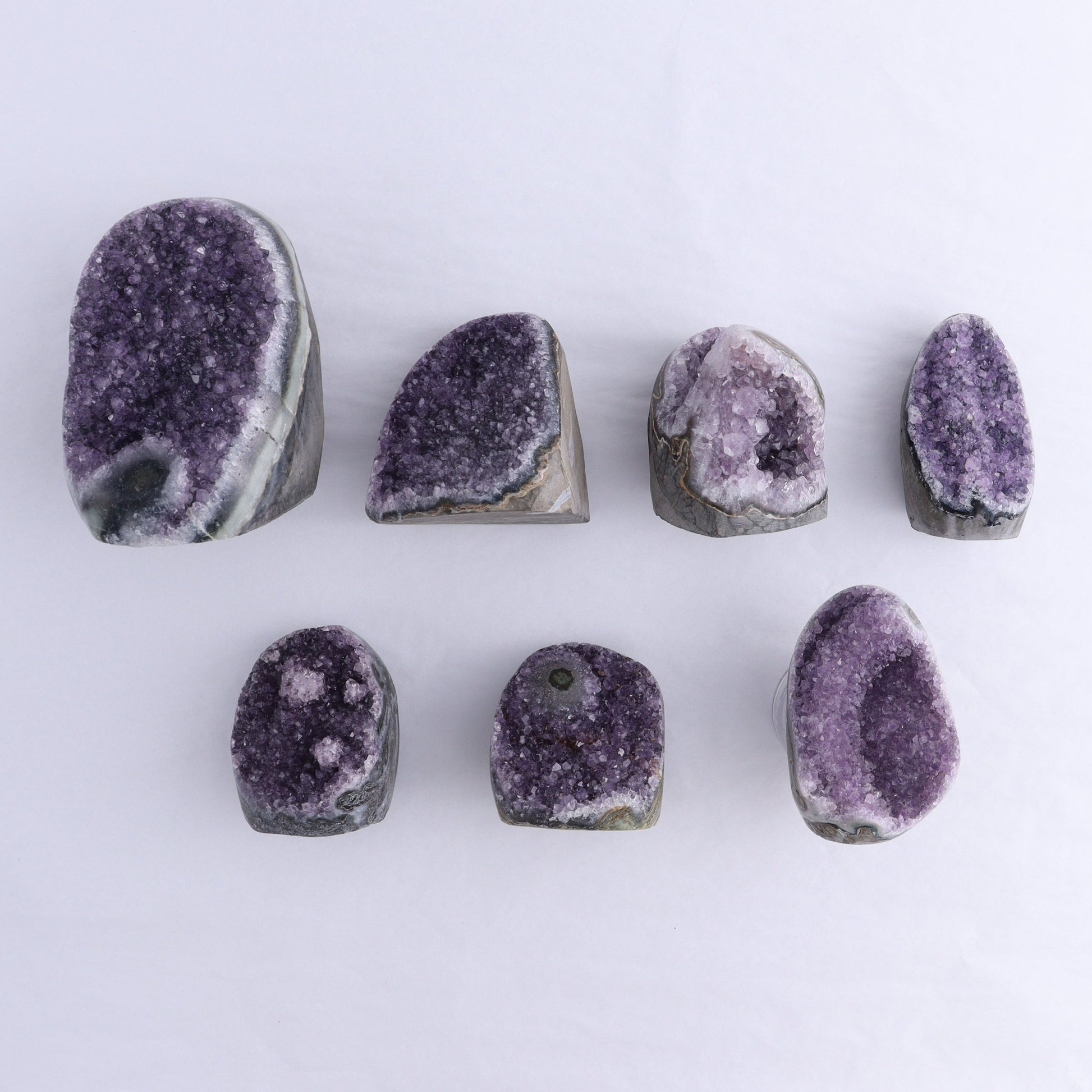 Uruguay Amethyst Cut Base Set of 7 - Expert Wholesale and Supplier of Wholesale Crystals & Bulk Gemstones, ["Amethyst","Cut Base","Uruguay"]