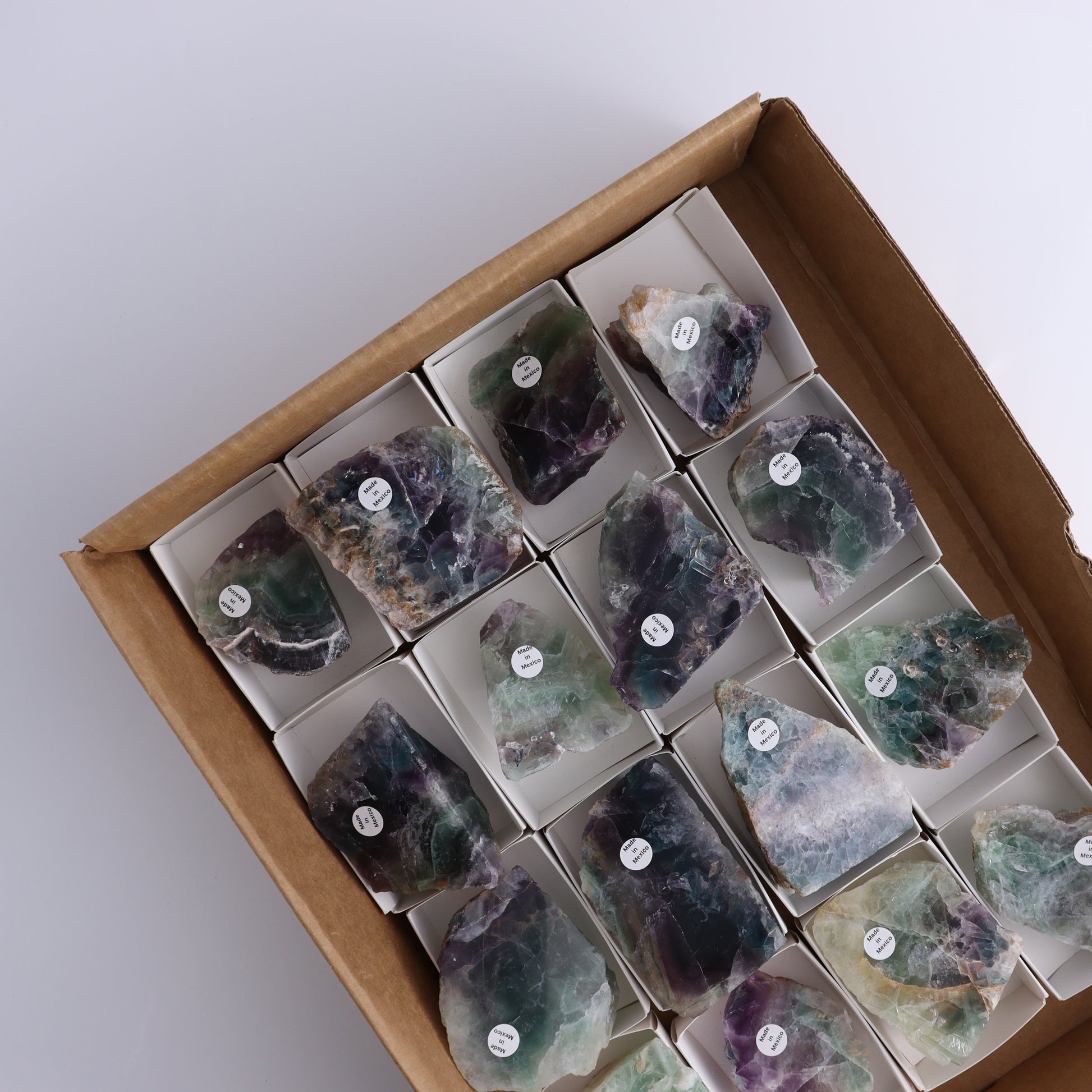 Fluorite Polished Face Cut Bases Set of 16 - Expert Wholesale and Supplier of Wholesale Crystals & Bulk Gemstones, ["Cut Base","Face Polished","Fluorite","Mexico"]