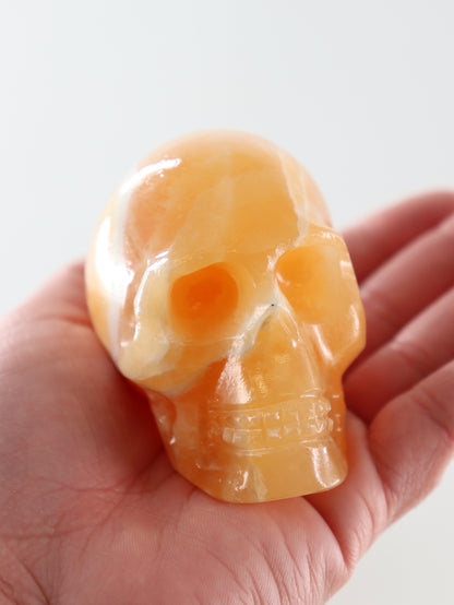 Orange Calcite Skulls Set of 4 - Expert Wholesale and Supplier of Wholesale Crystals & Bulk Gemstones, ["Calcite","Orange Calcite","Skulls"]