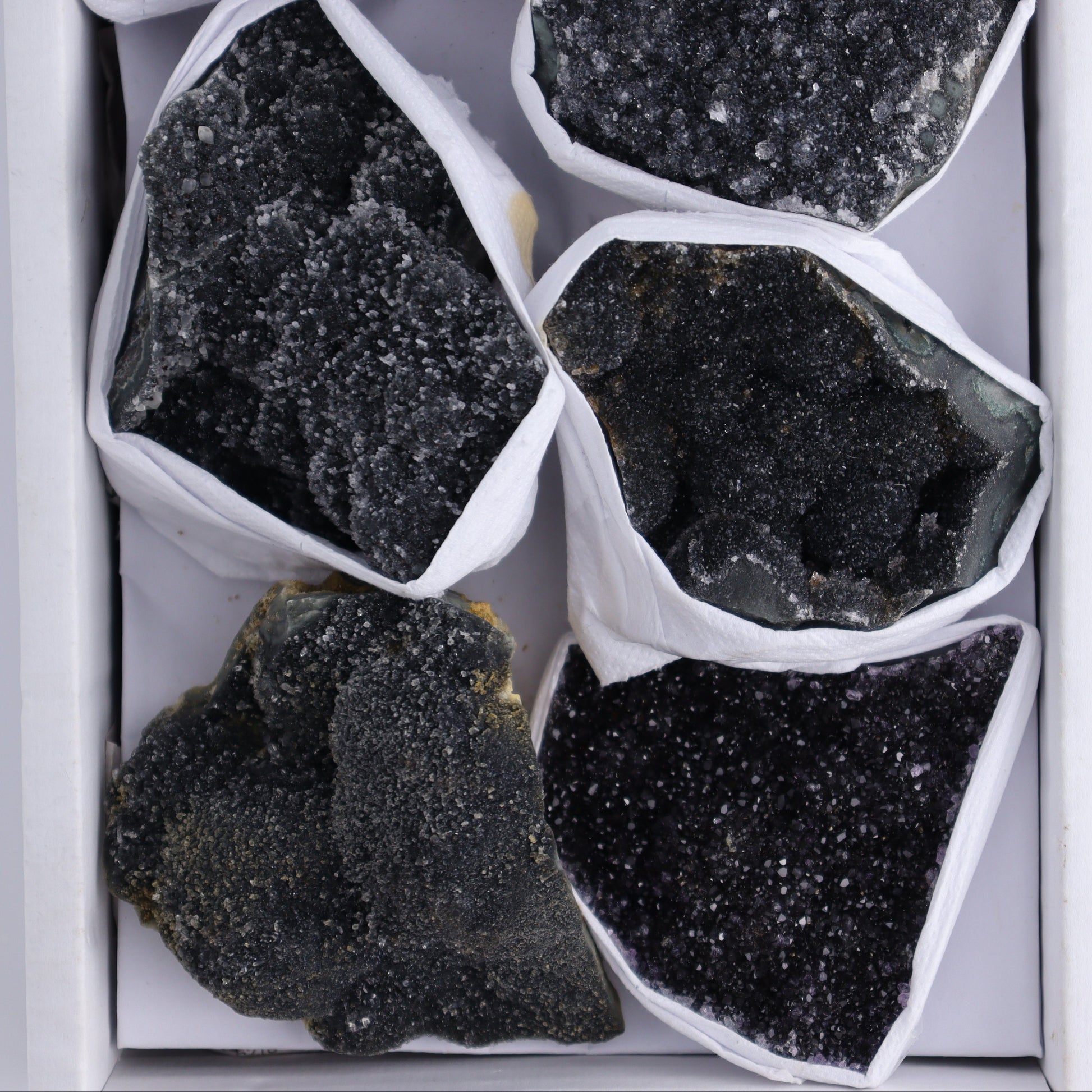 Uruguay Black Amethyst Flat of 7 - Expert Wholesale and Supplier of Wholesale Crystals & Bulk Gemstones, ["Amethyst","Black Amethyst","Clusters","Uruguay"]