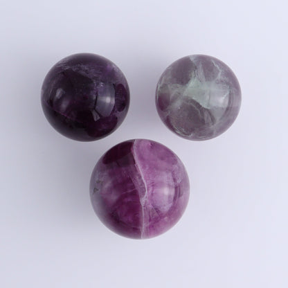 Purple Fluorite Spheres Set of 9 - Expert Wholesale and Supplier of Wholesale Crystals & Bulk Gemstones, ["Fluorite","Purple Fluorite","Spheres"]