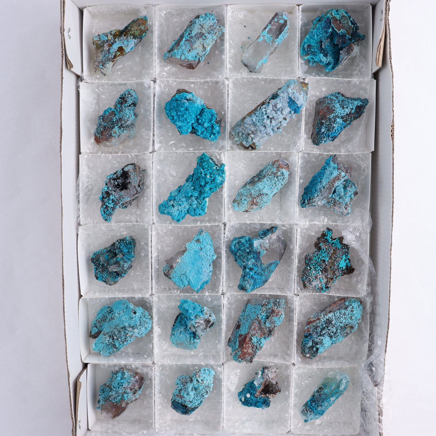 Chrysocolla on Quartz Roughs Set of 24 - Expert Wholesale and Supplier of Wholesale Crystals & Bulk Gemstones, ["Chrysocolla","Flats","Freeforms","Peru","Quartz","Rough"]