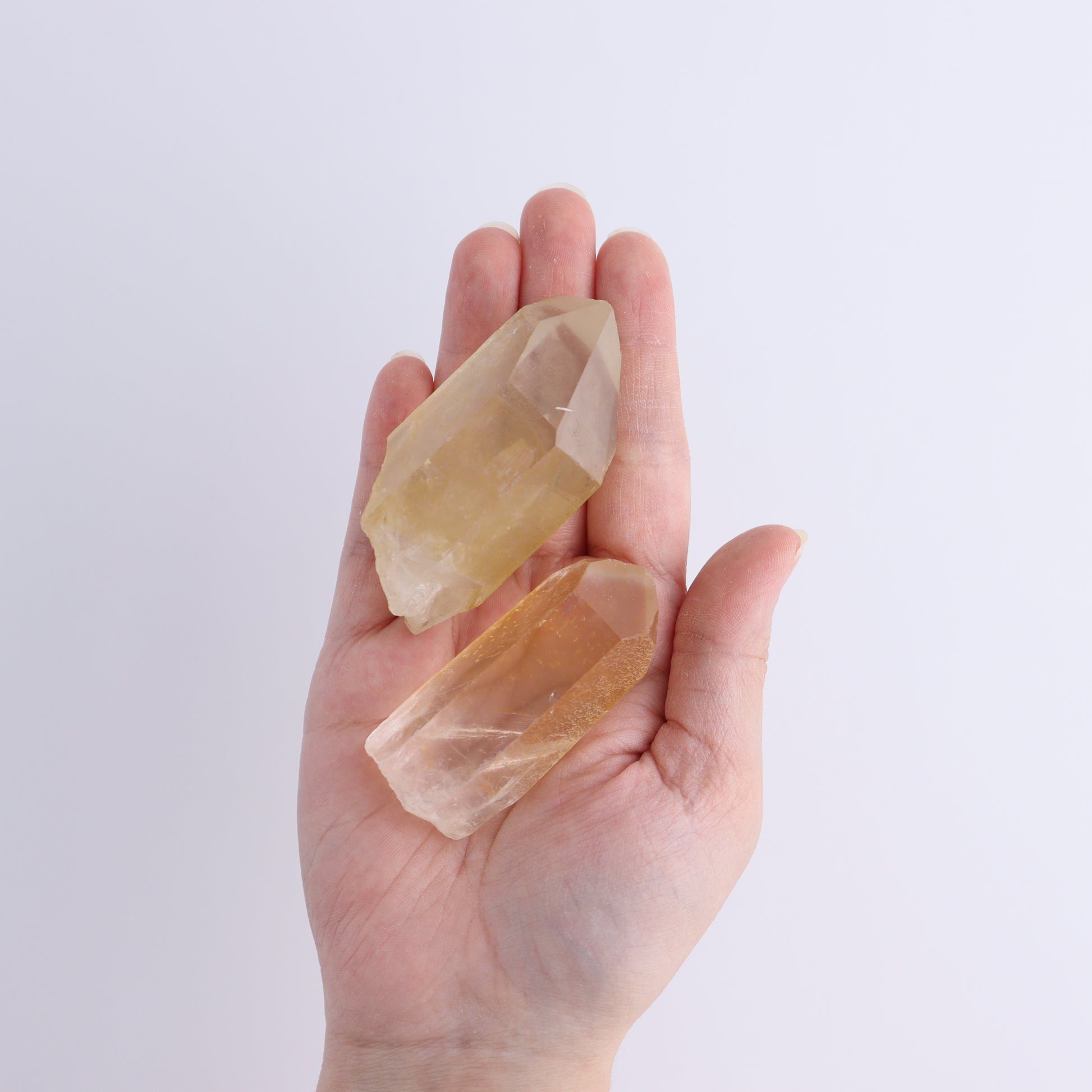 Tangerine Quartz Rough Towers Set of 16 - Expert Wholesale and Supplier of Wholesale Crystals & Bulk Gemstones, ["Quartz","Rough","Tangerine Quartz","Towers"]