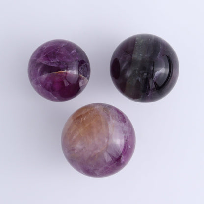 Purple Fluorite Spheres Set of 9 - Expert Wholesale and Supplier of Wholesale Crystals & Bulk Gemstones, ["Fluorite","Purple Fluorite","Spheres"]