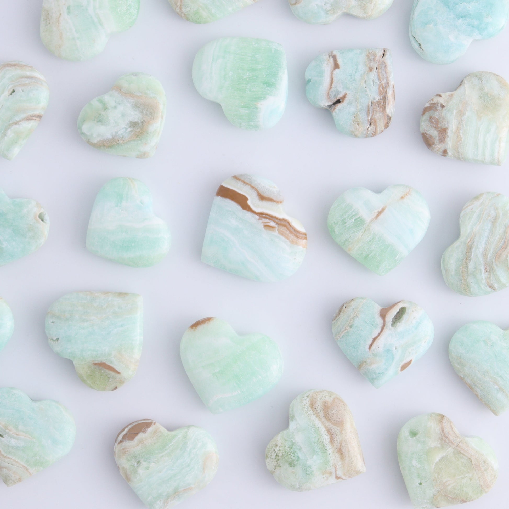 One Caribbean Calcite Little Heart - Expert Wholesale and Supplier of Wholesale Crystals & Bulk Gemstones, ["Calcite","Caribbean Calcite","Hearts","Pakistan"]