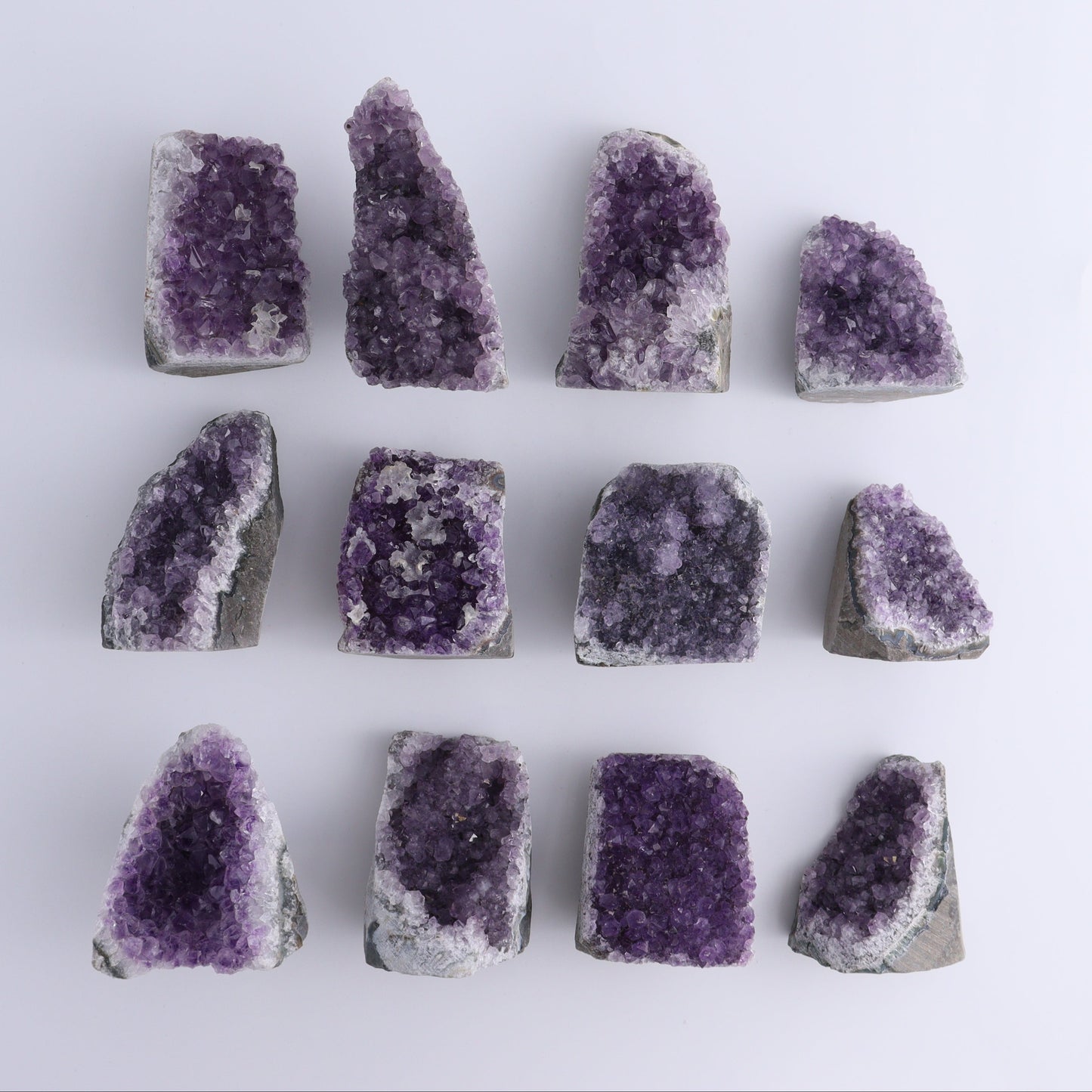 Uruguay Amethyst Cut Base Set of 12 - Expert Wholesale and Supplier of Wholesale Crystals & Bulk Gemstones, ["Amethyst","Cut Base","Uruguay"]